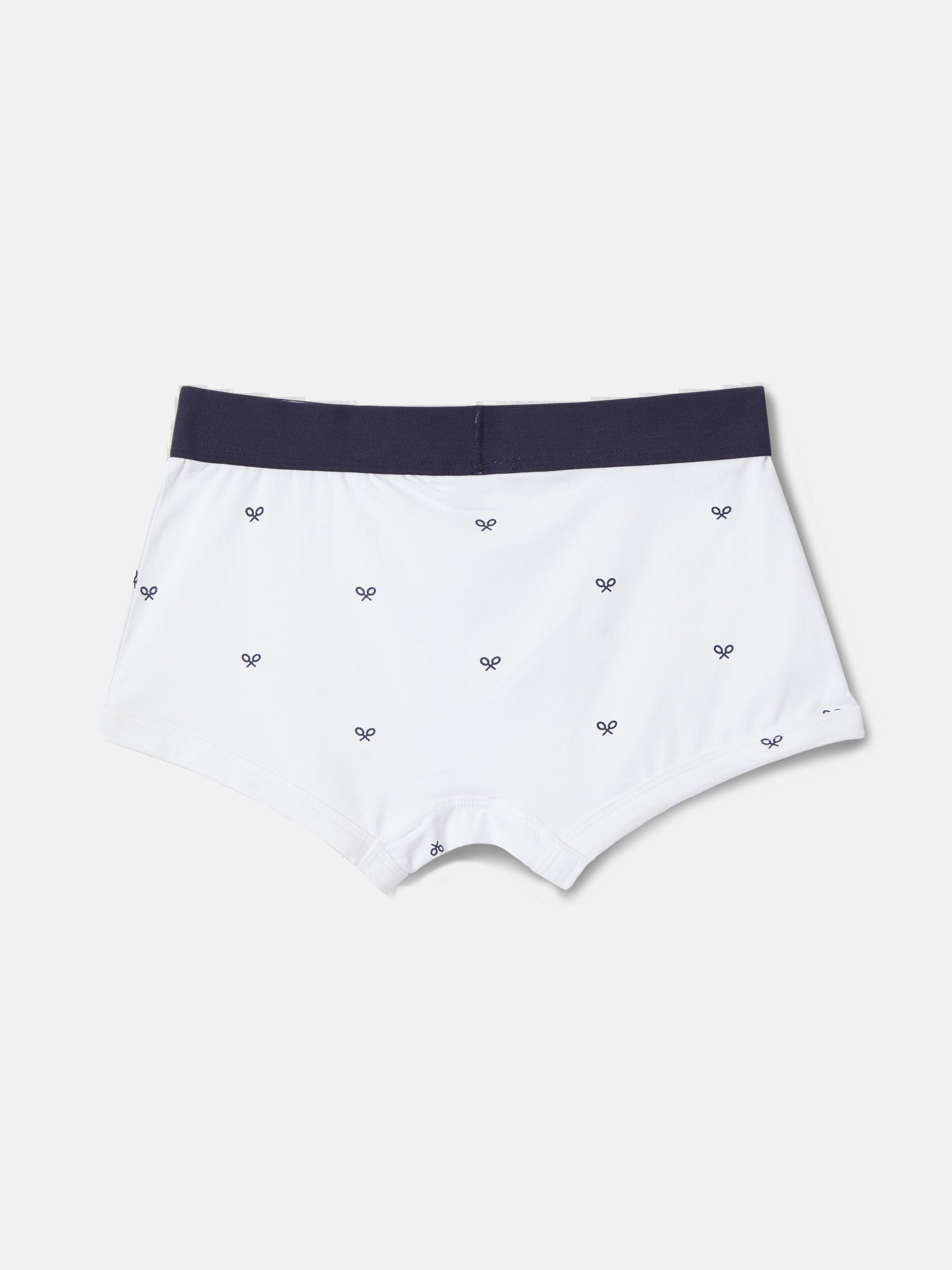 White boxer with navy rackets