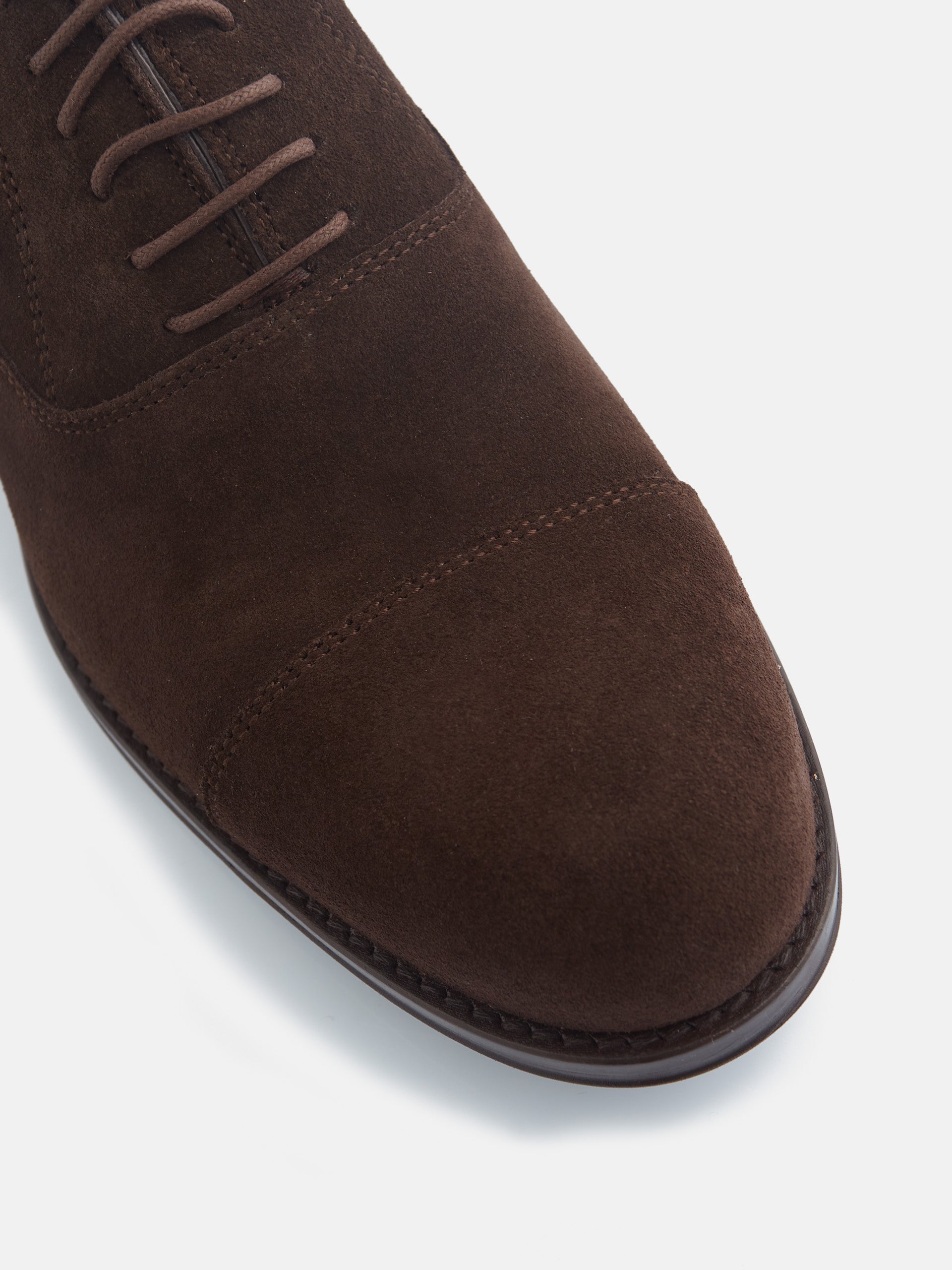 Classic suede shoe with dark brown laces