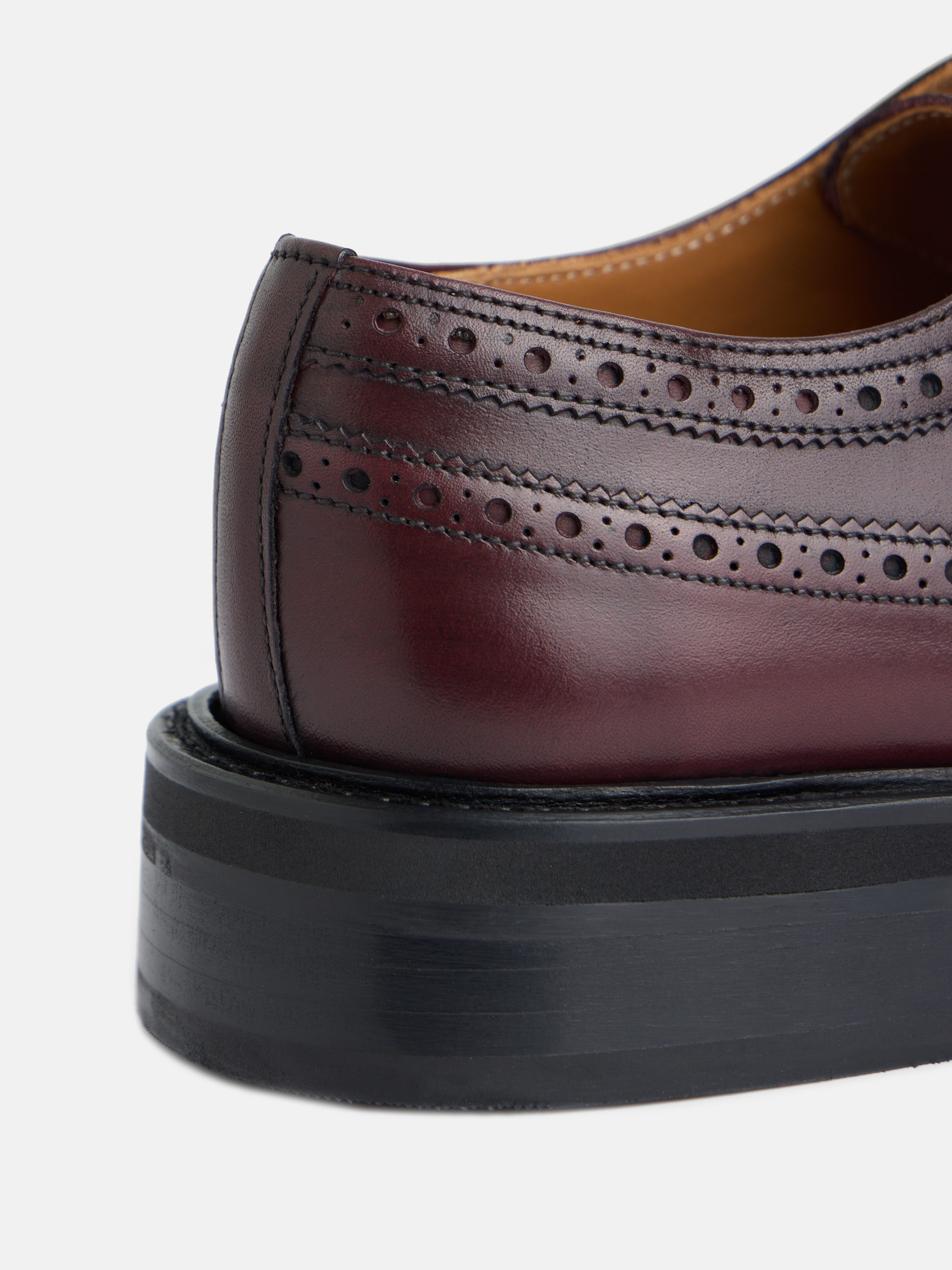 Classic burgundy perforated leather shoe