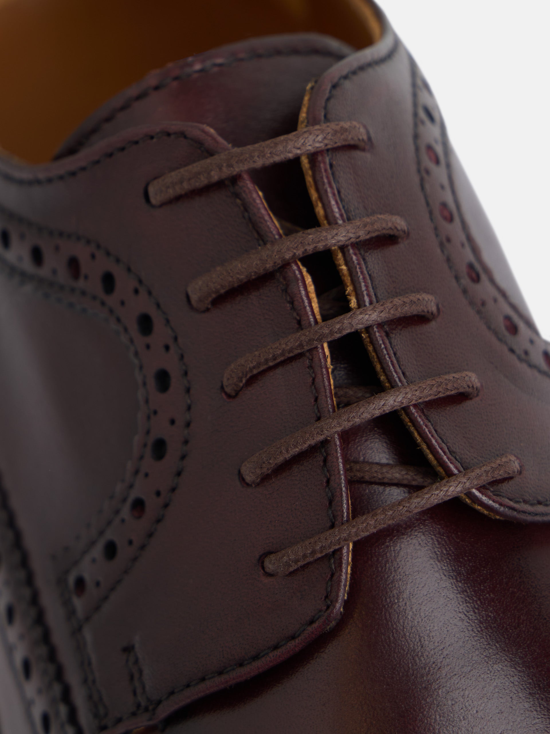 Classic burgundy perforated leather shoe