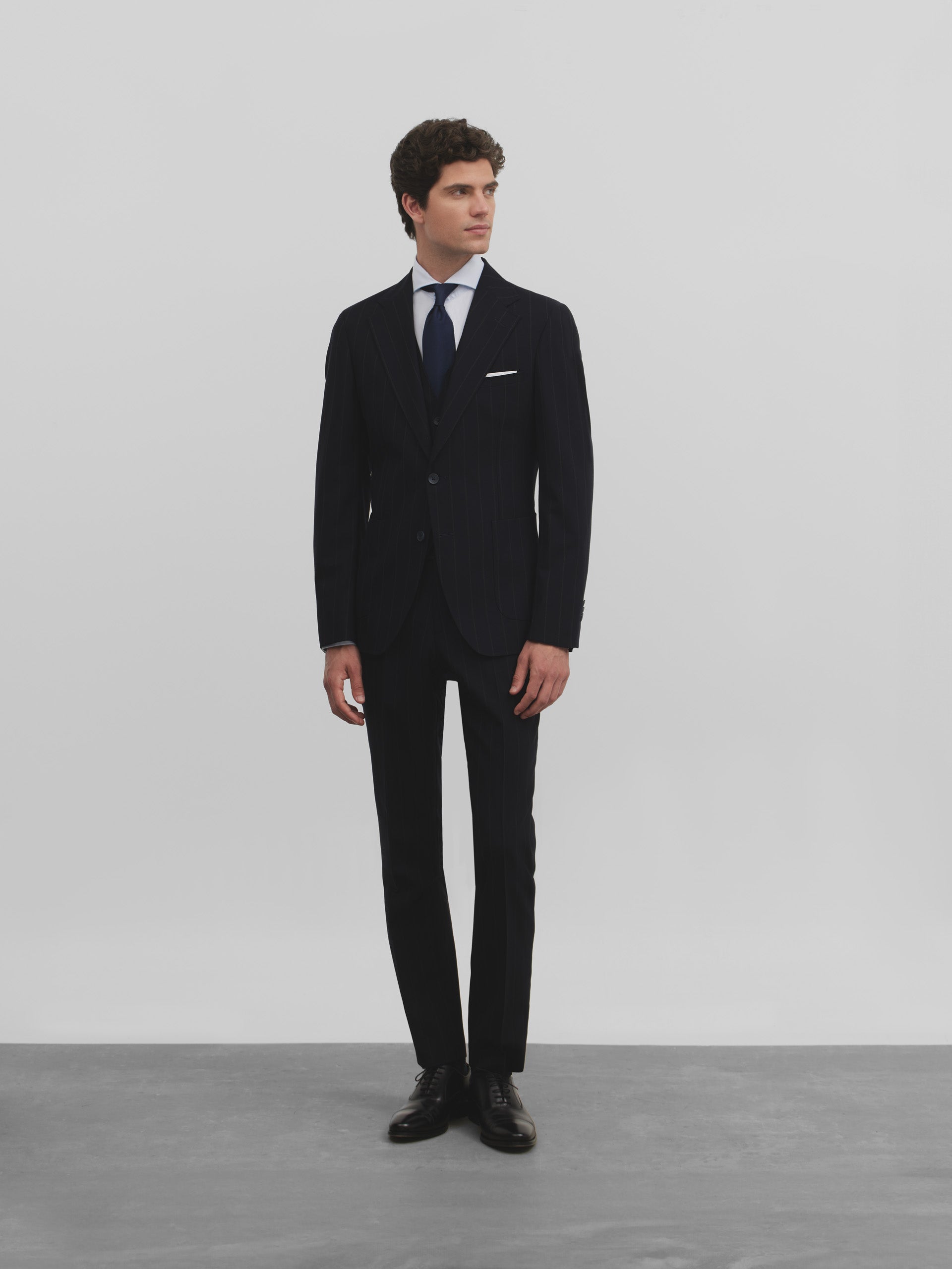 Navy blue pinstripe suit jacket