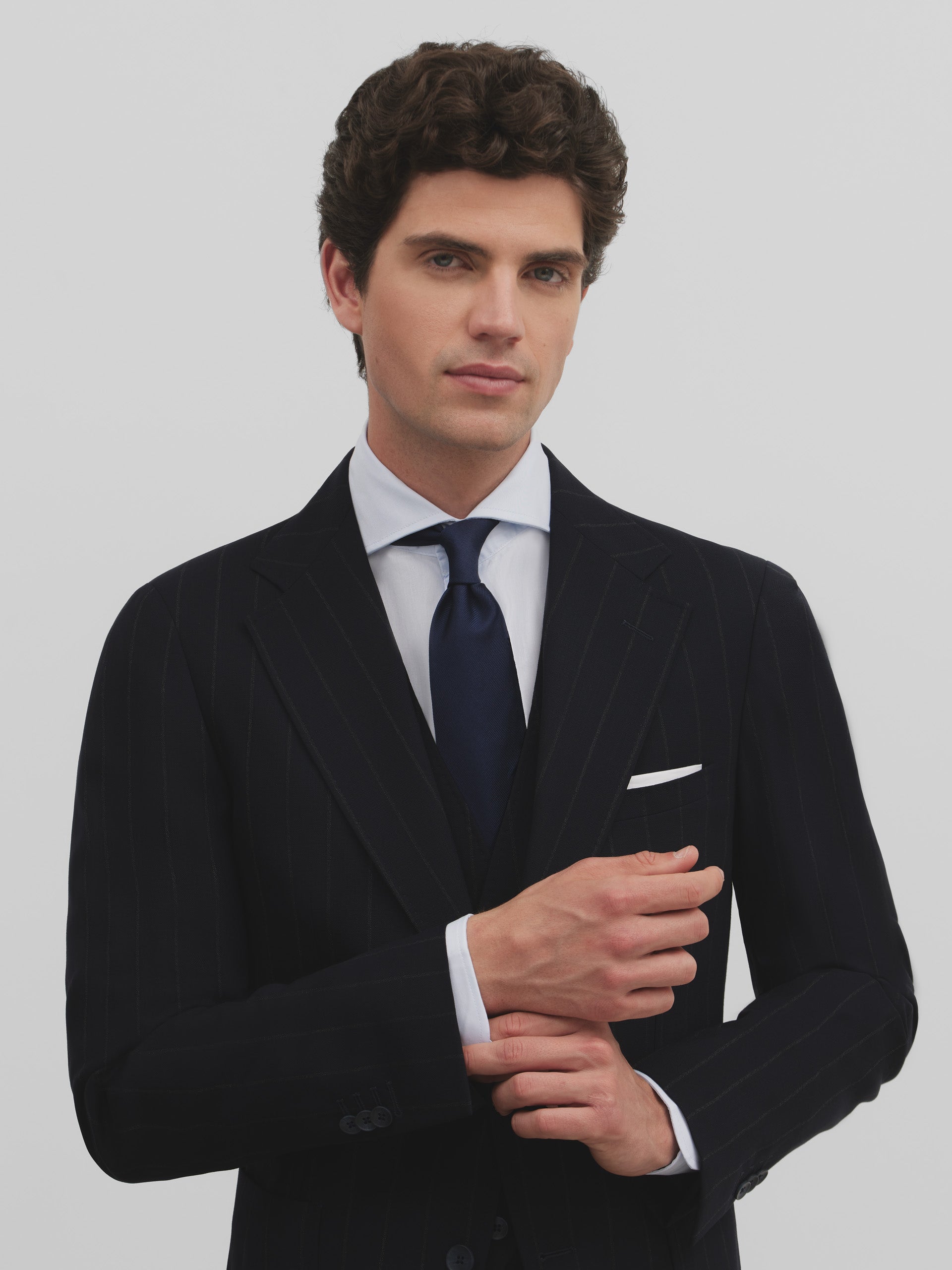 Navy blue pinstripe suit jacket