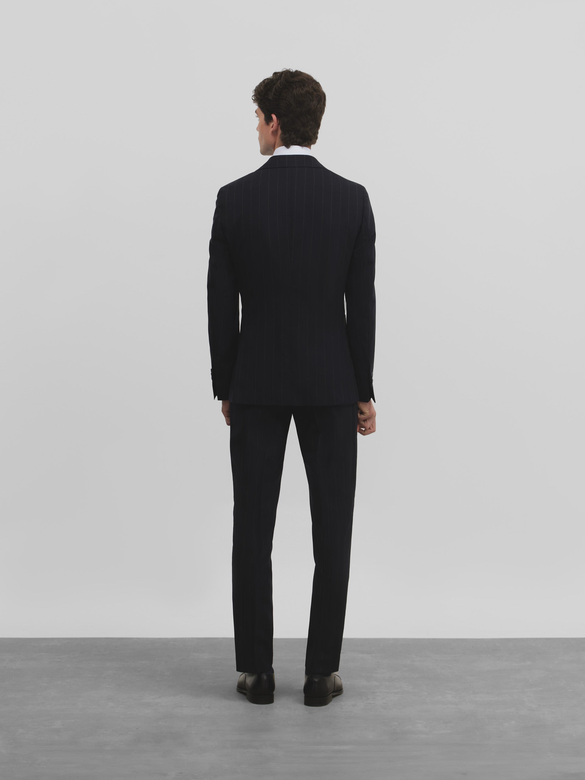 Navy blue pinstripe suit jacket