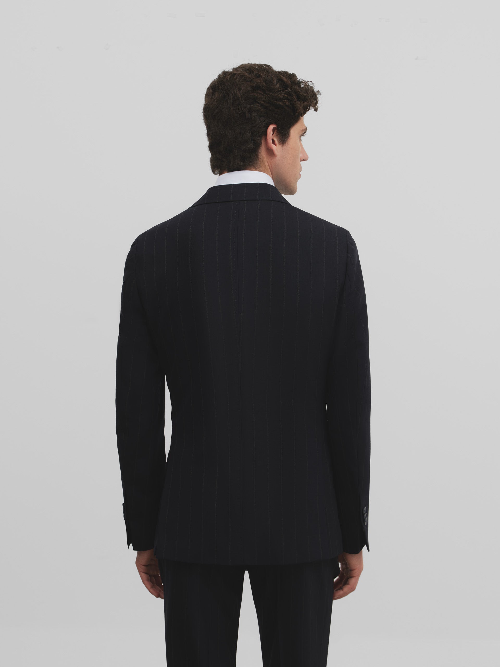 Navy blue pinstripe suit jacket