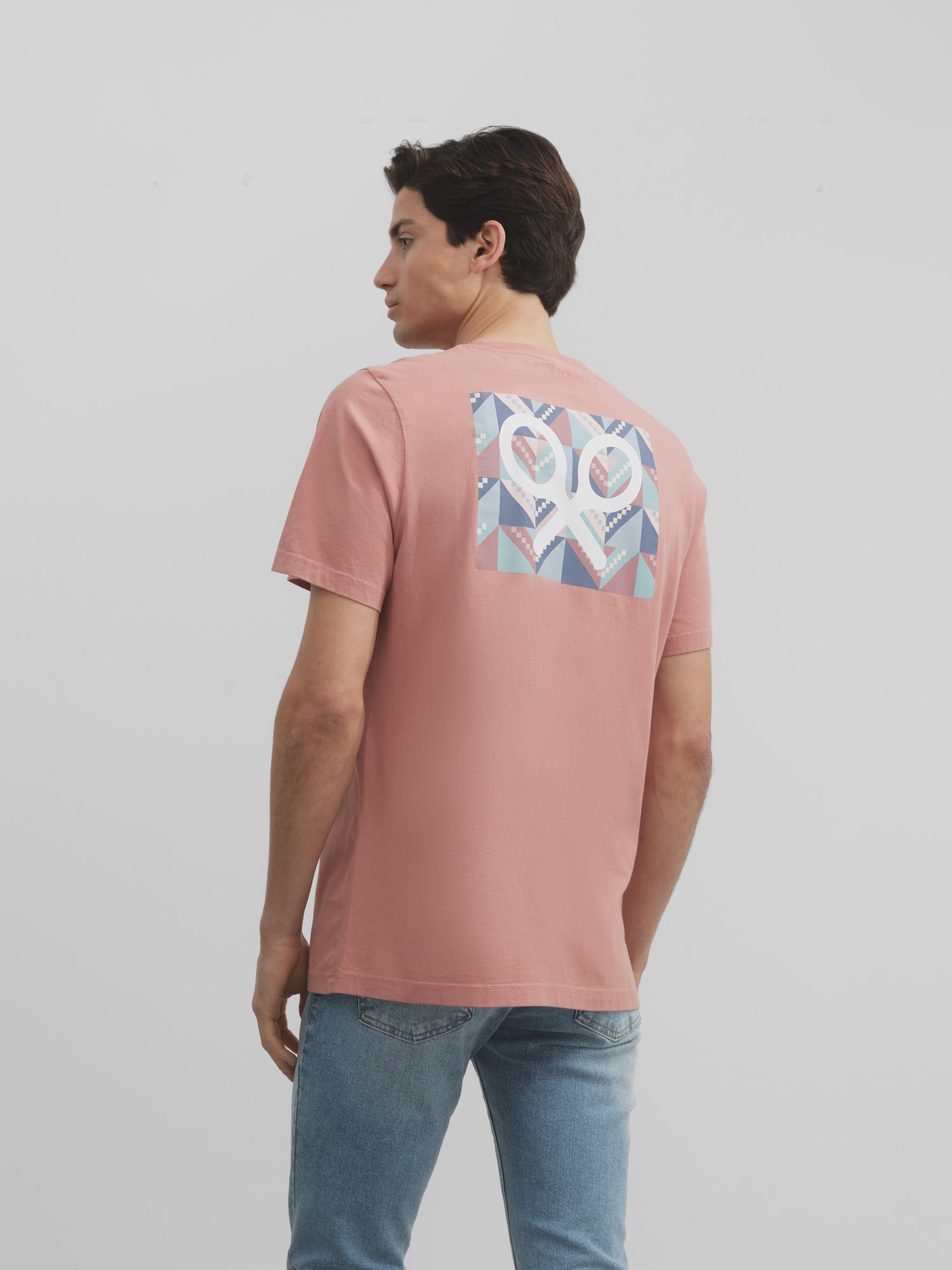 Camiseta raqueta geometrica coral