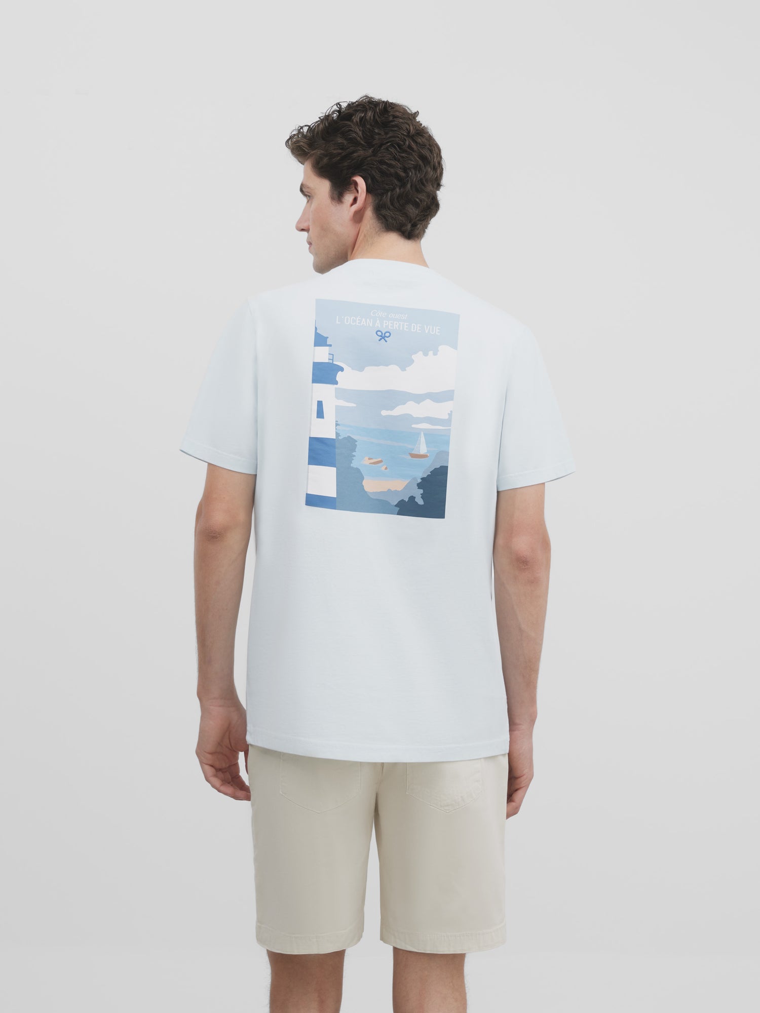Light blue lighthouse landscape t-shirt