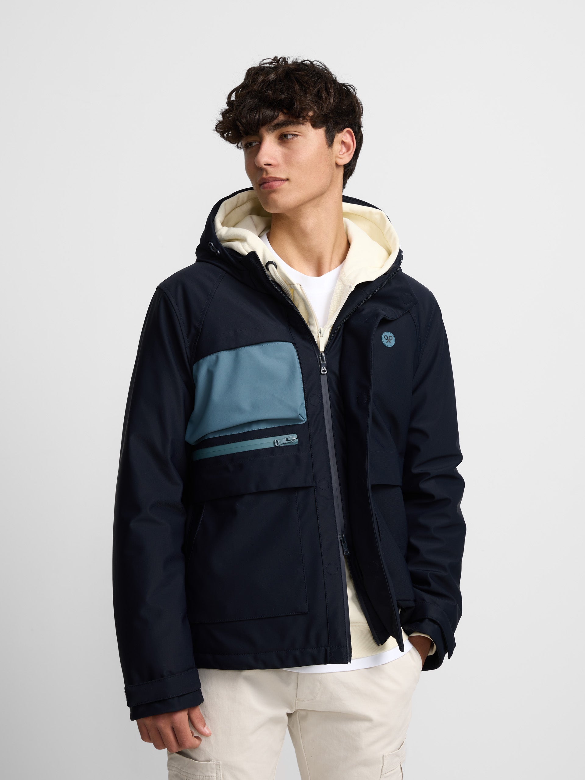 Navy blue hooded technical jacket