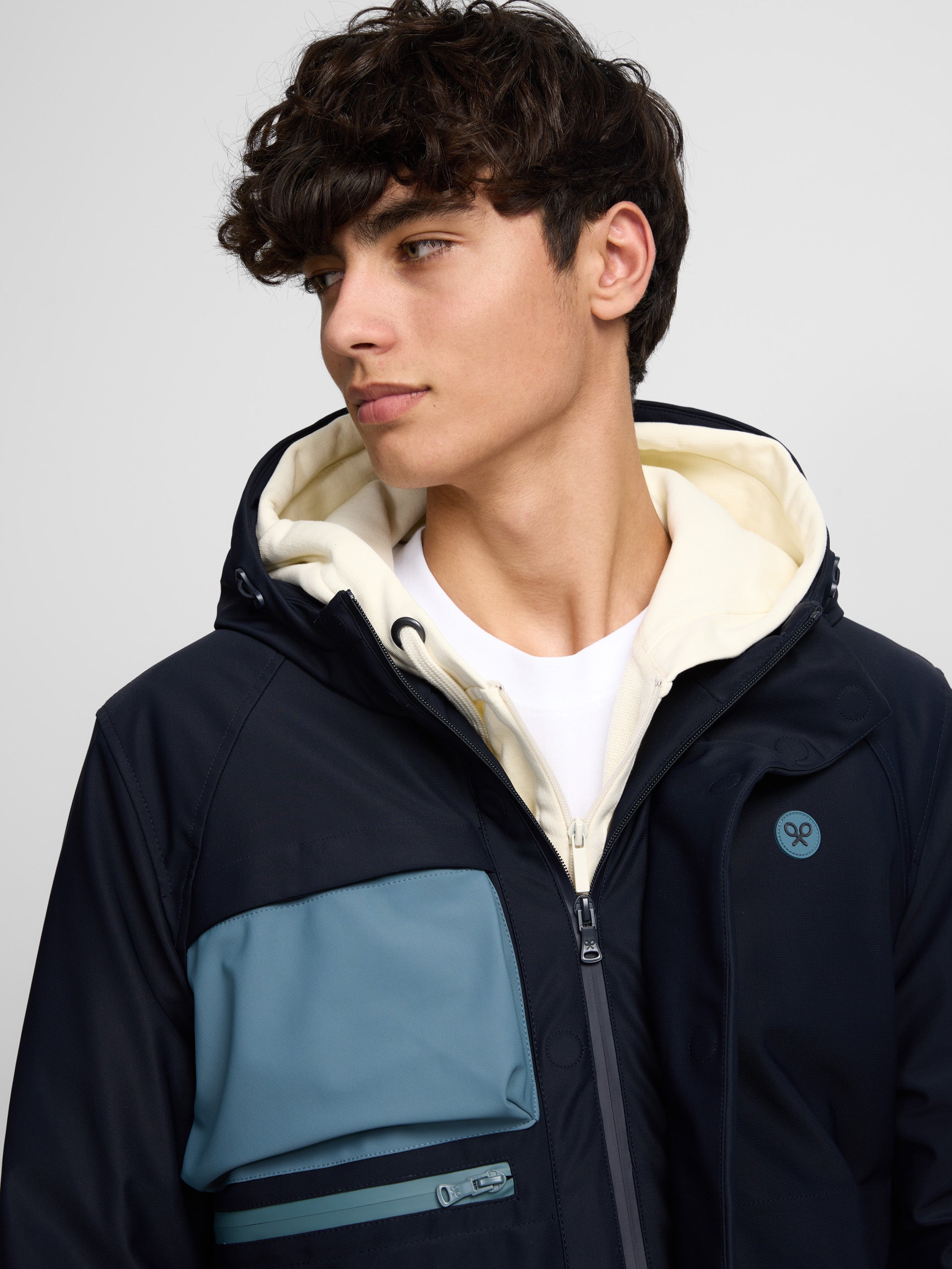 Navy blue hooded technical jacket