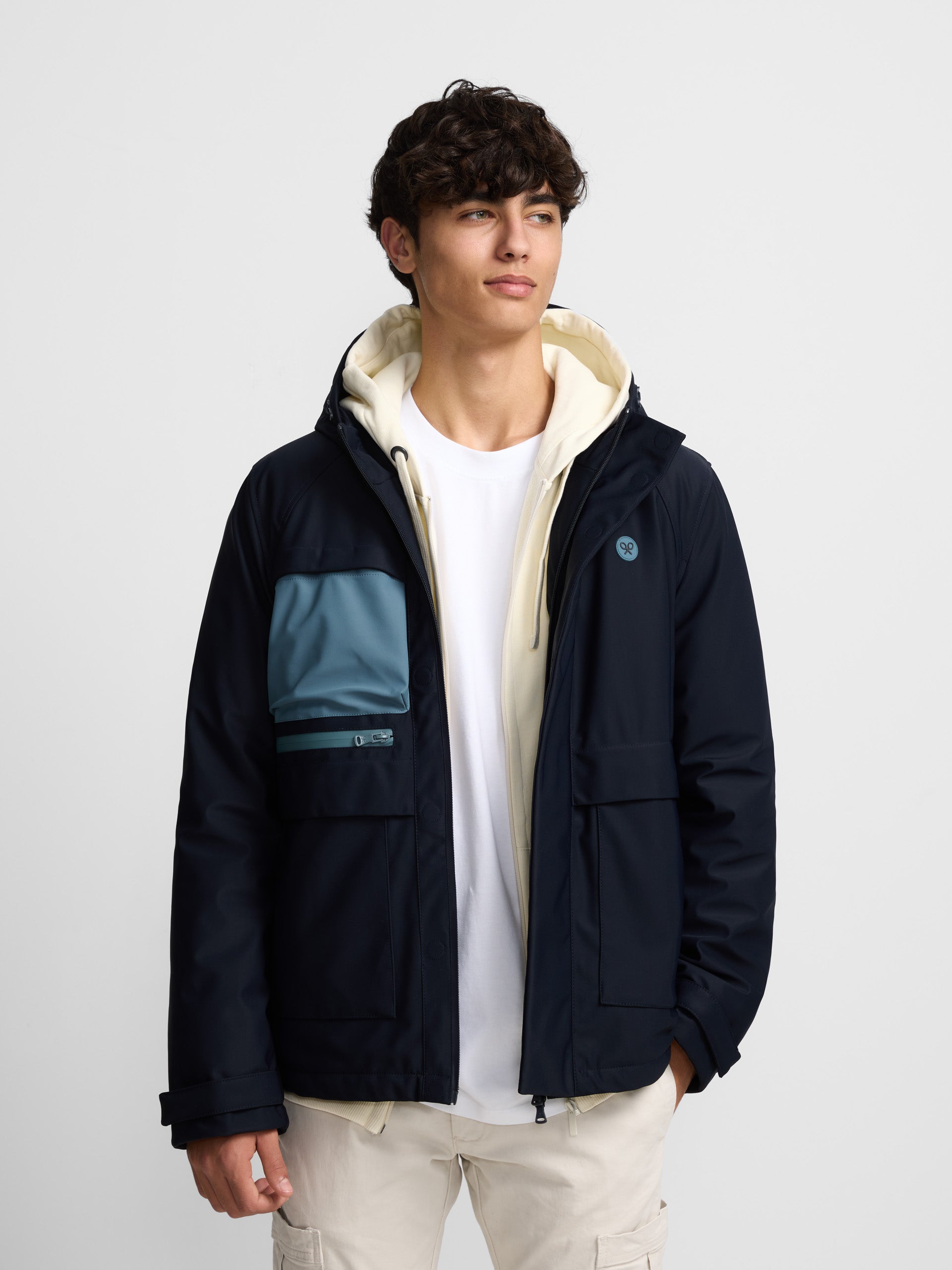 Navy blue hooded technical jacket