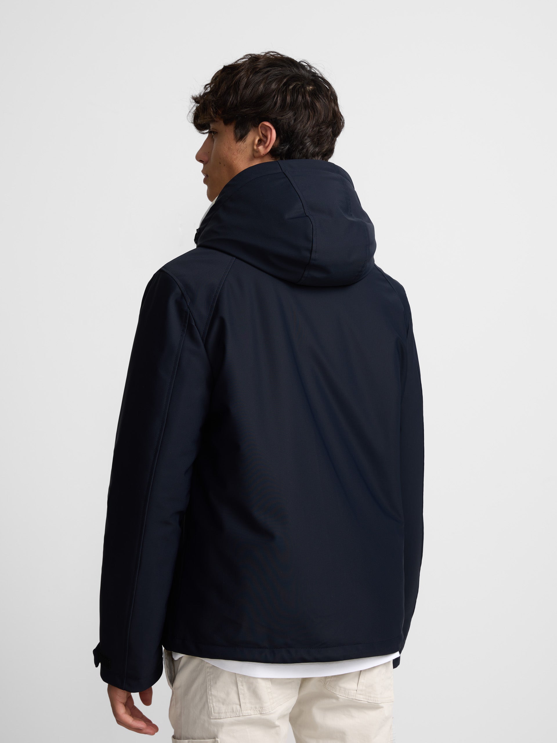 Navy blue hooded technical jacket