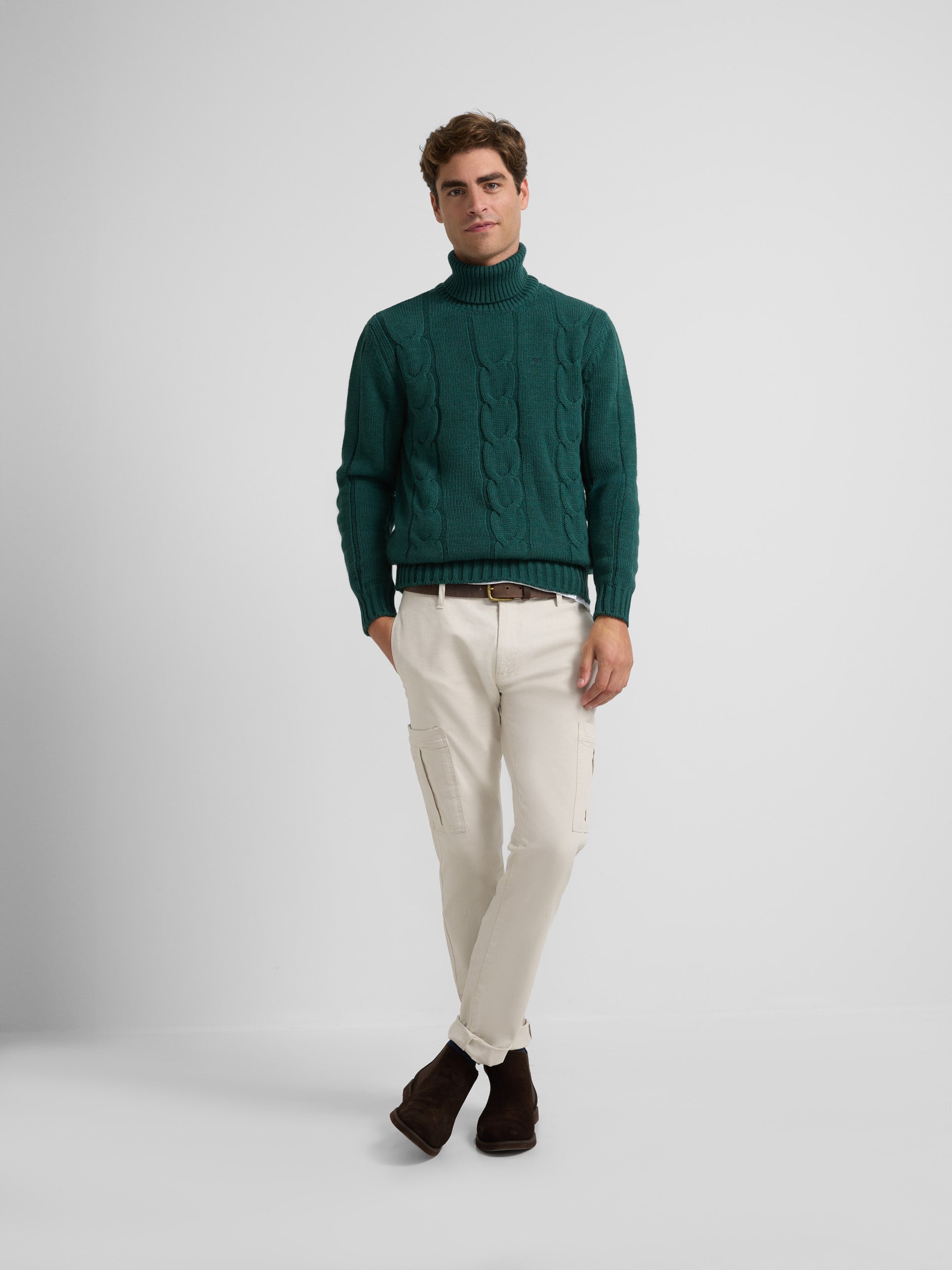 Green turtleneck sweater with eights