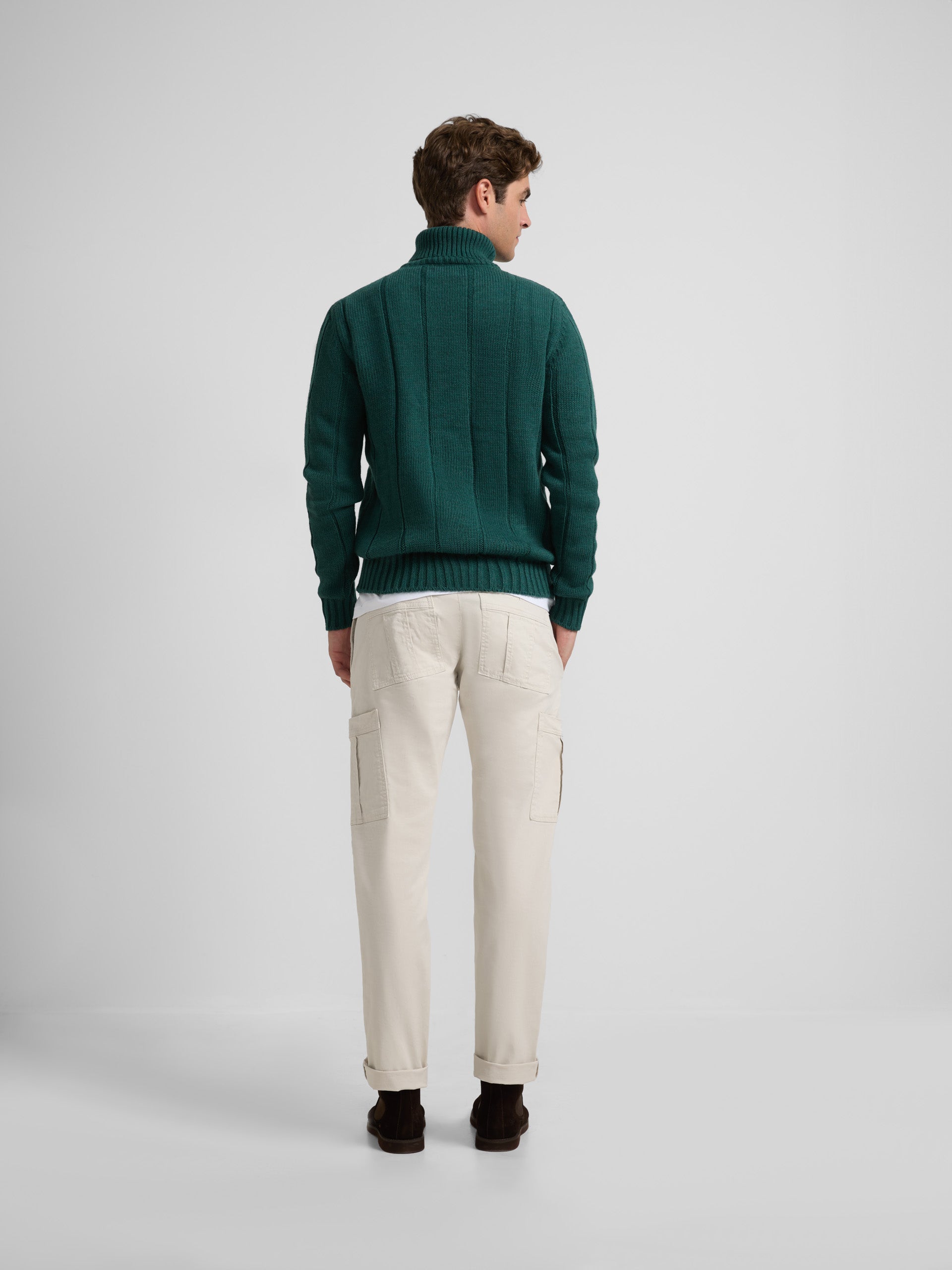 Green turtleneck sweater with eights