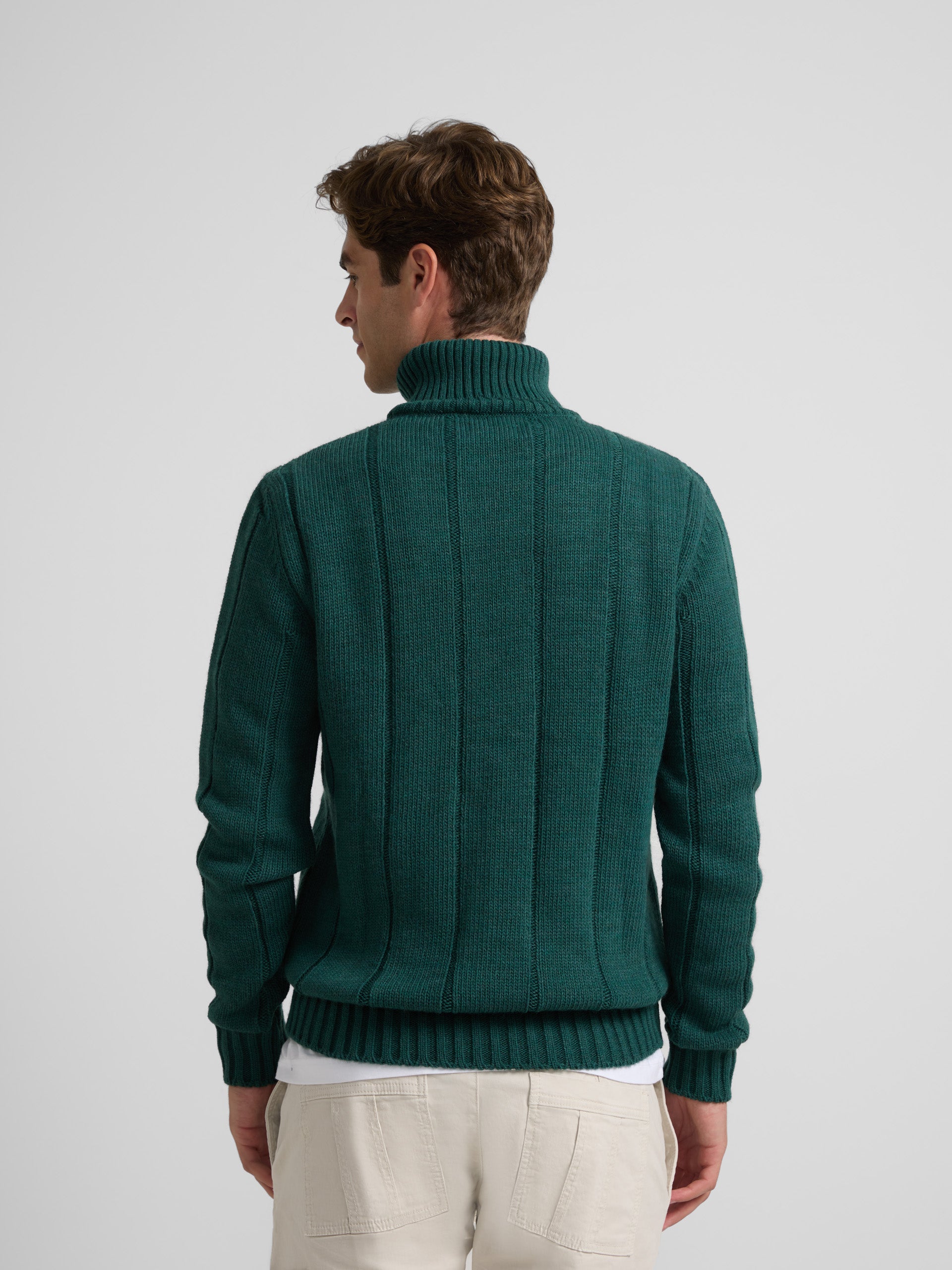 Green turtleneck sweater with eights