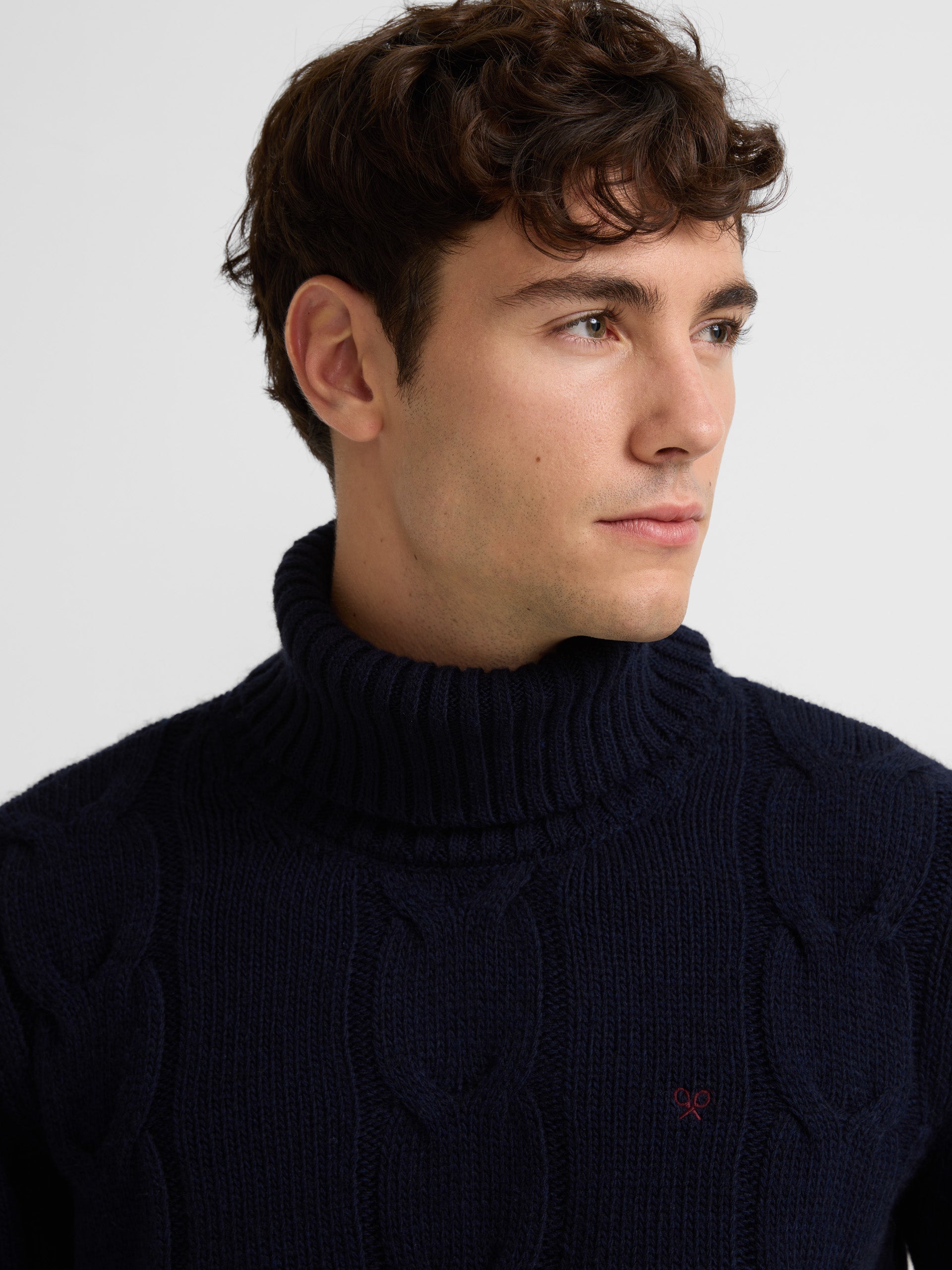 Navy blue turtleneck sweater with eights