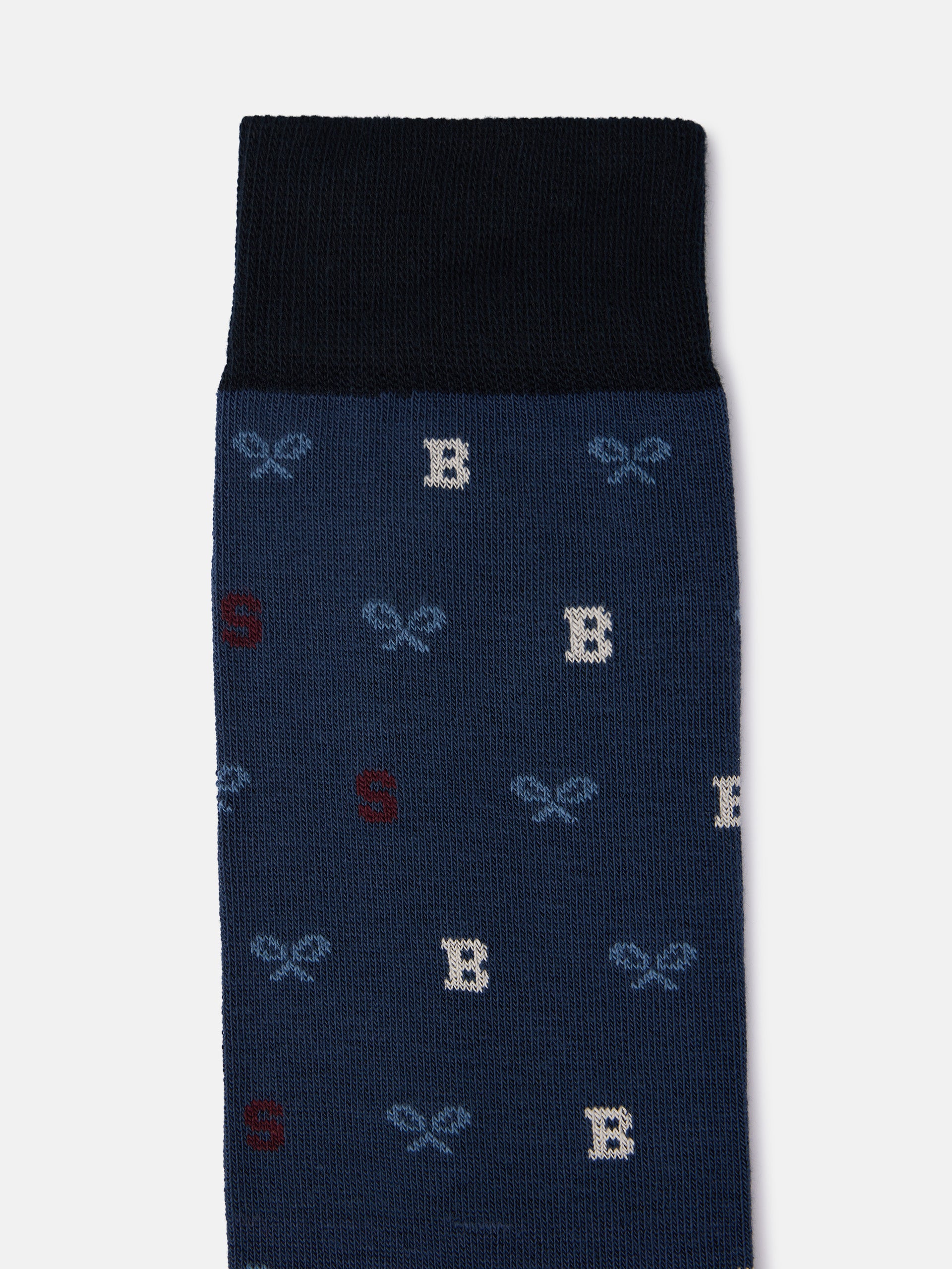 Whistling sock with blue letter motifs