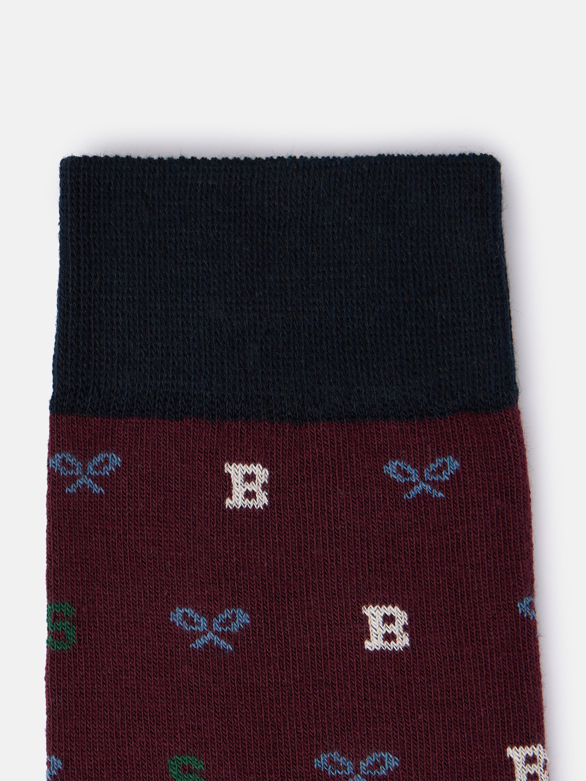 Whistling sock with burgundy letter motifs