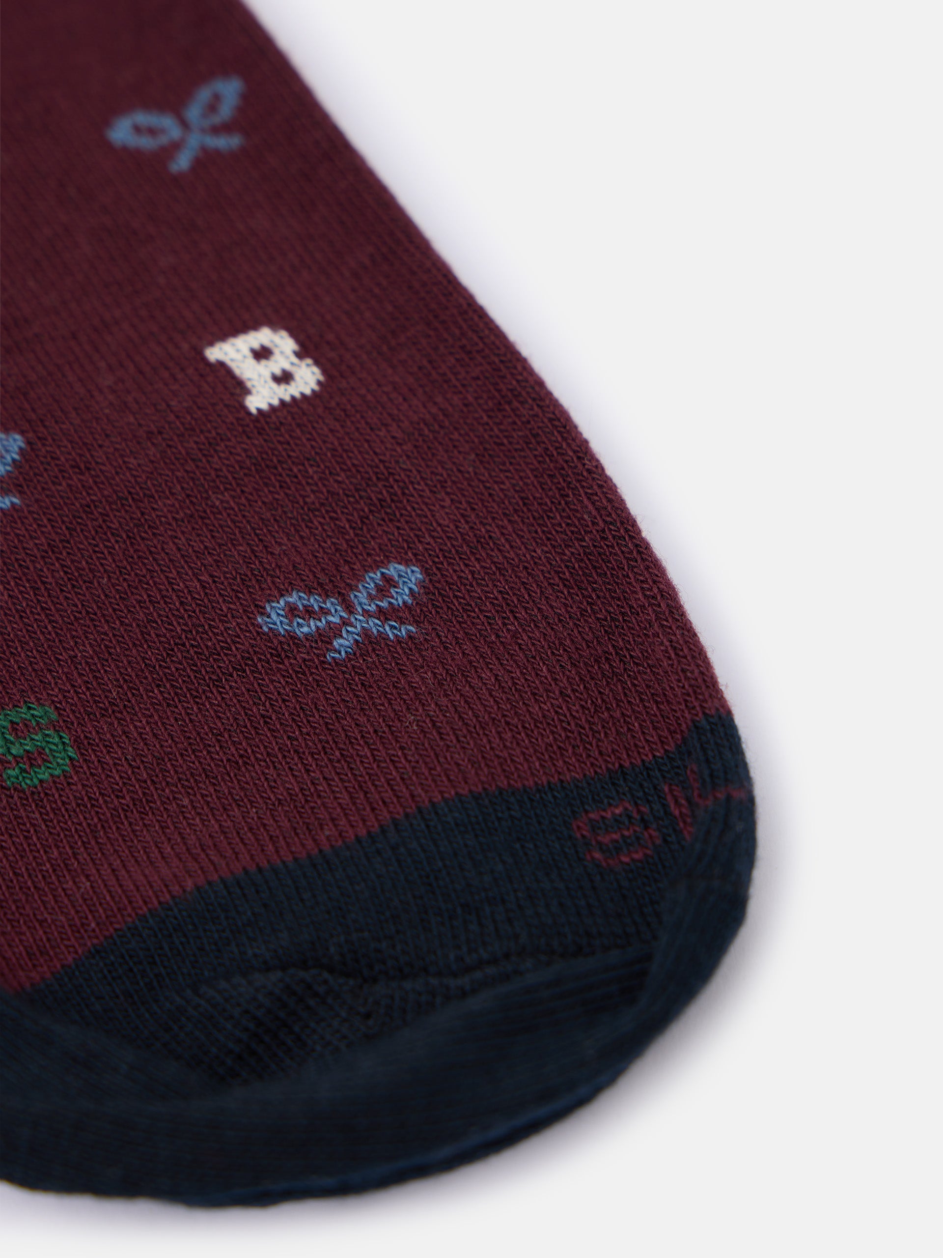 Whistling sock with burgundy letter motifs