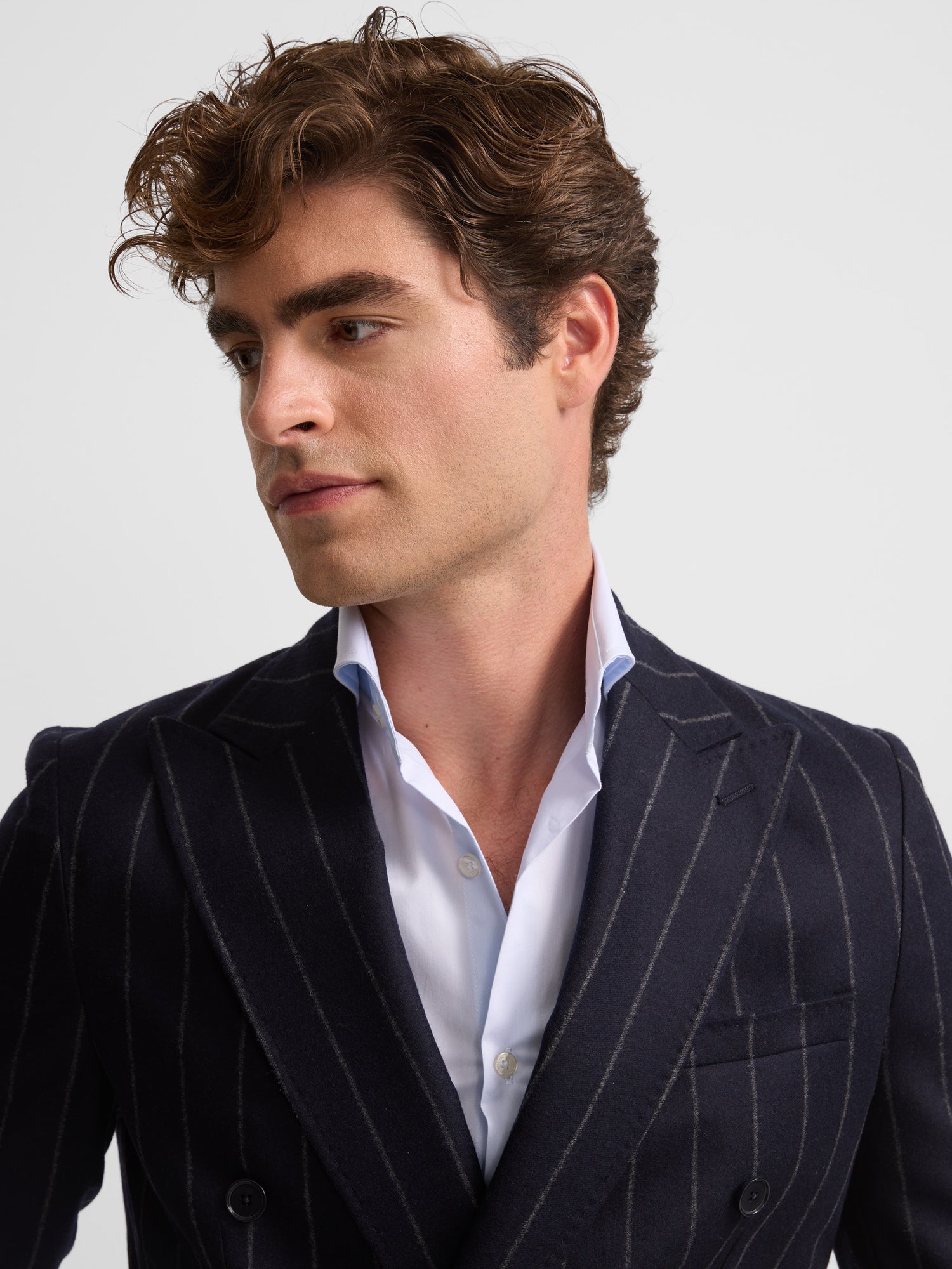 Double-breasted blazer with wide navy blue stripes