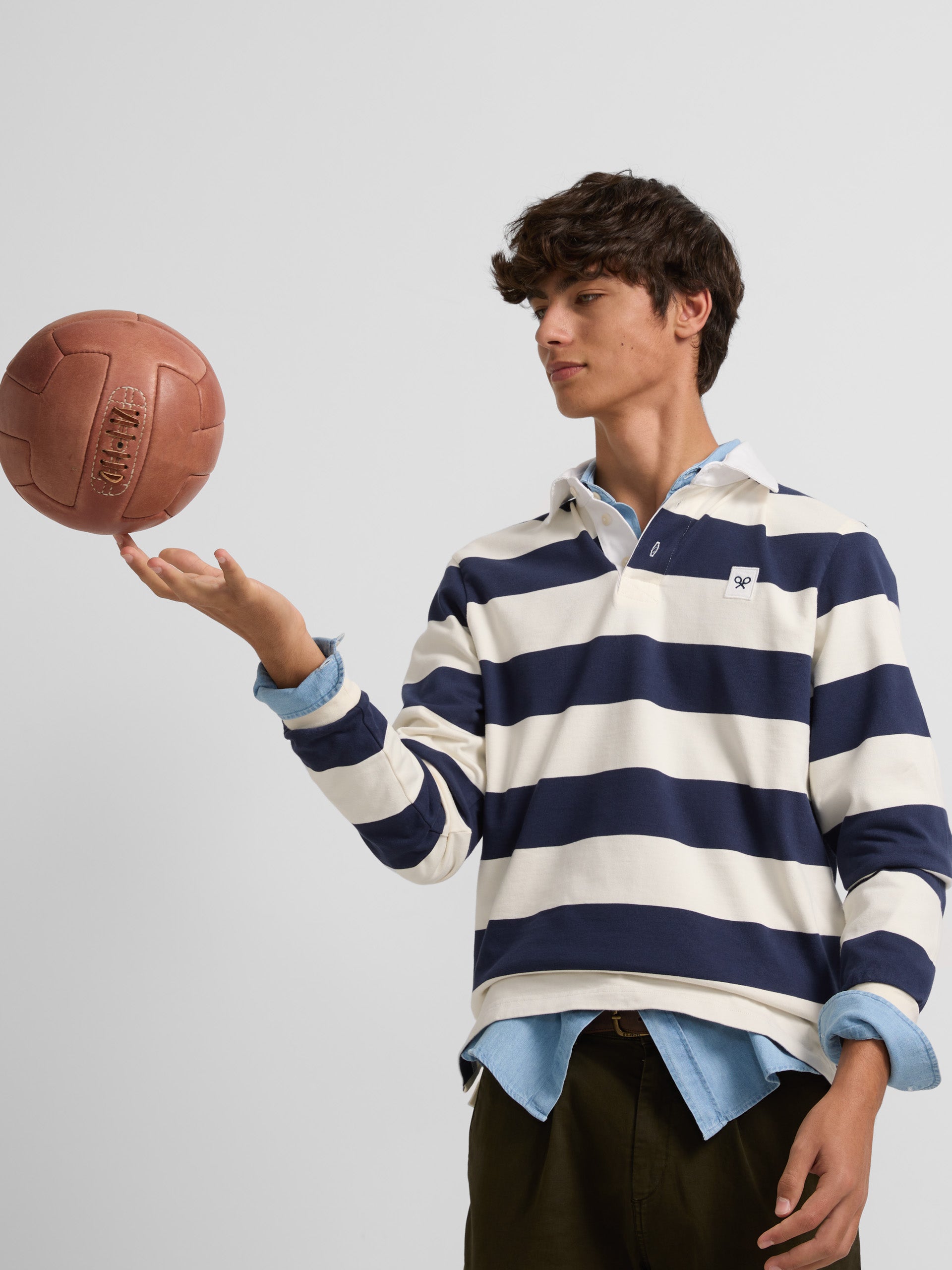 Classic long sleeve polo with blue stripes