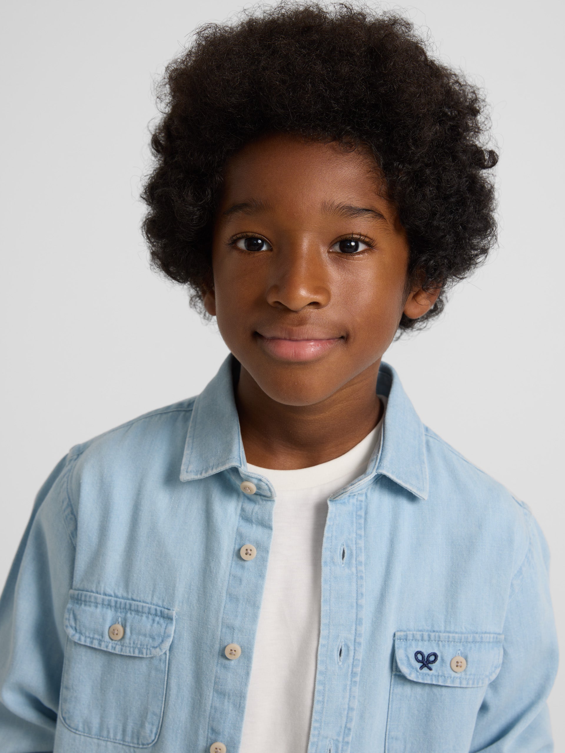 Kids sport shirt with light blue denim pockets