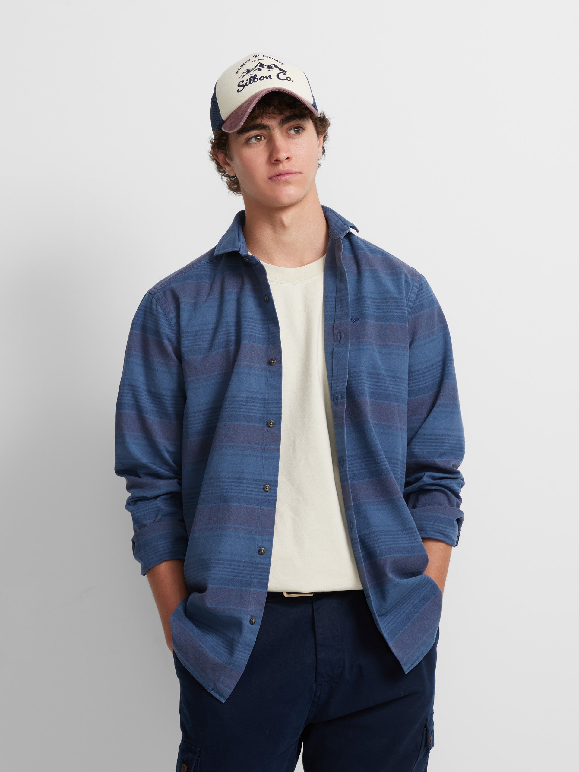 Sport shirt with horizontal stripes and blue jeans