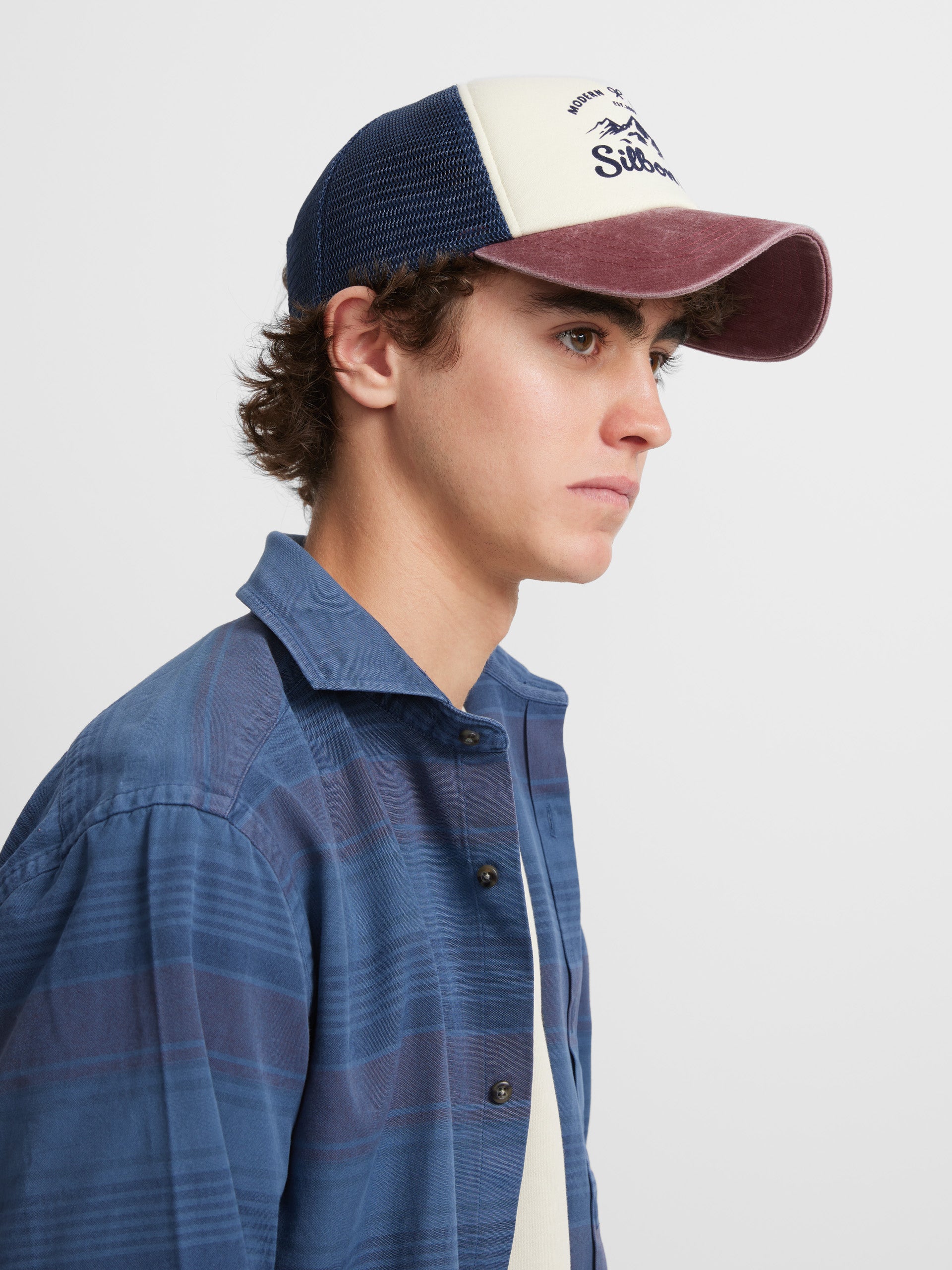 Sport shirt with horizontal stripes and blue jeans