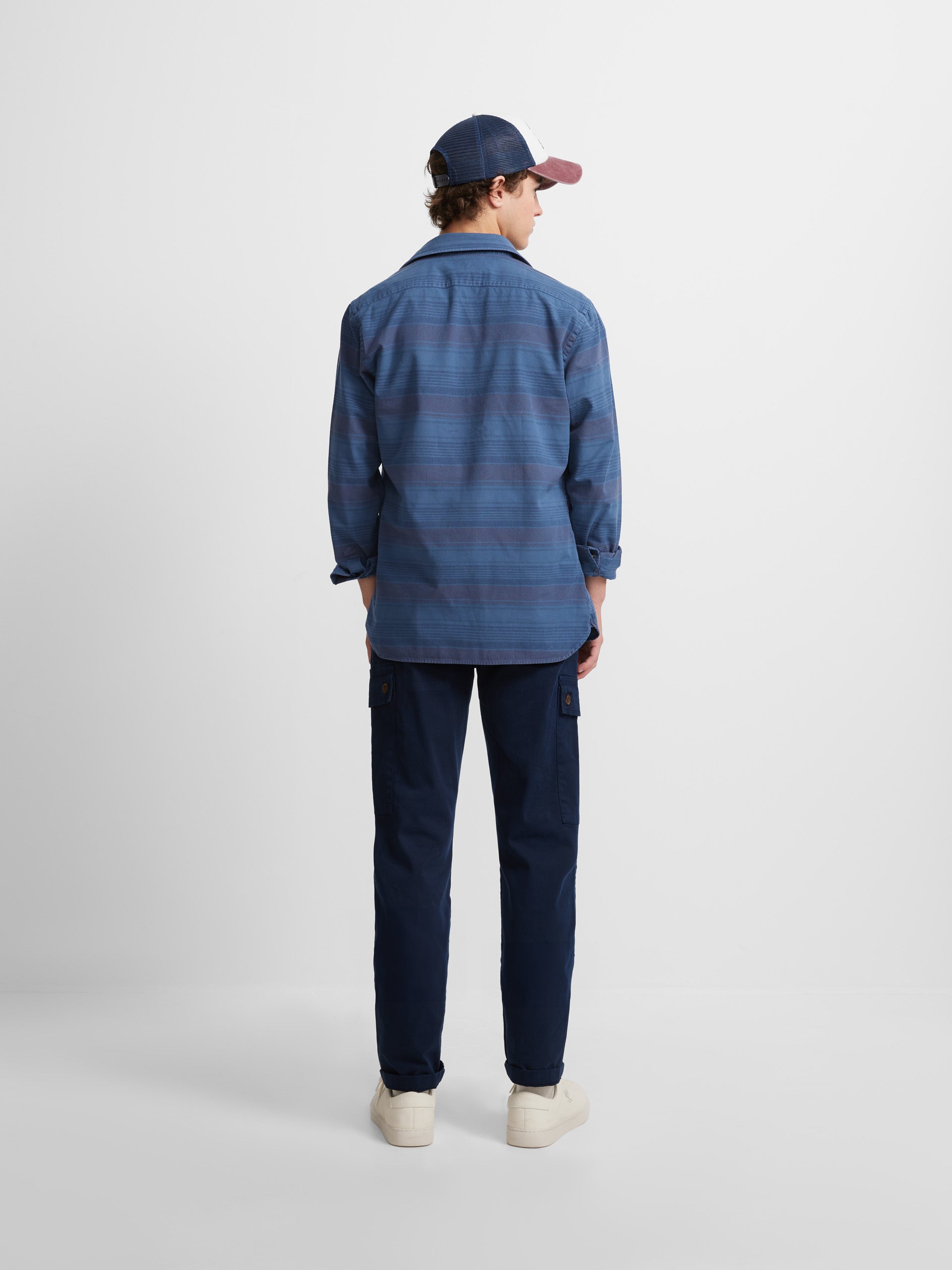 Sport shirt with horizontal stripes and blue jeans