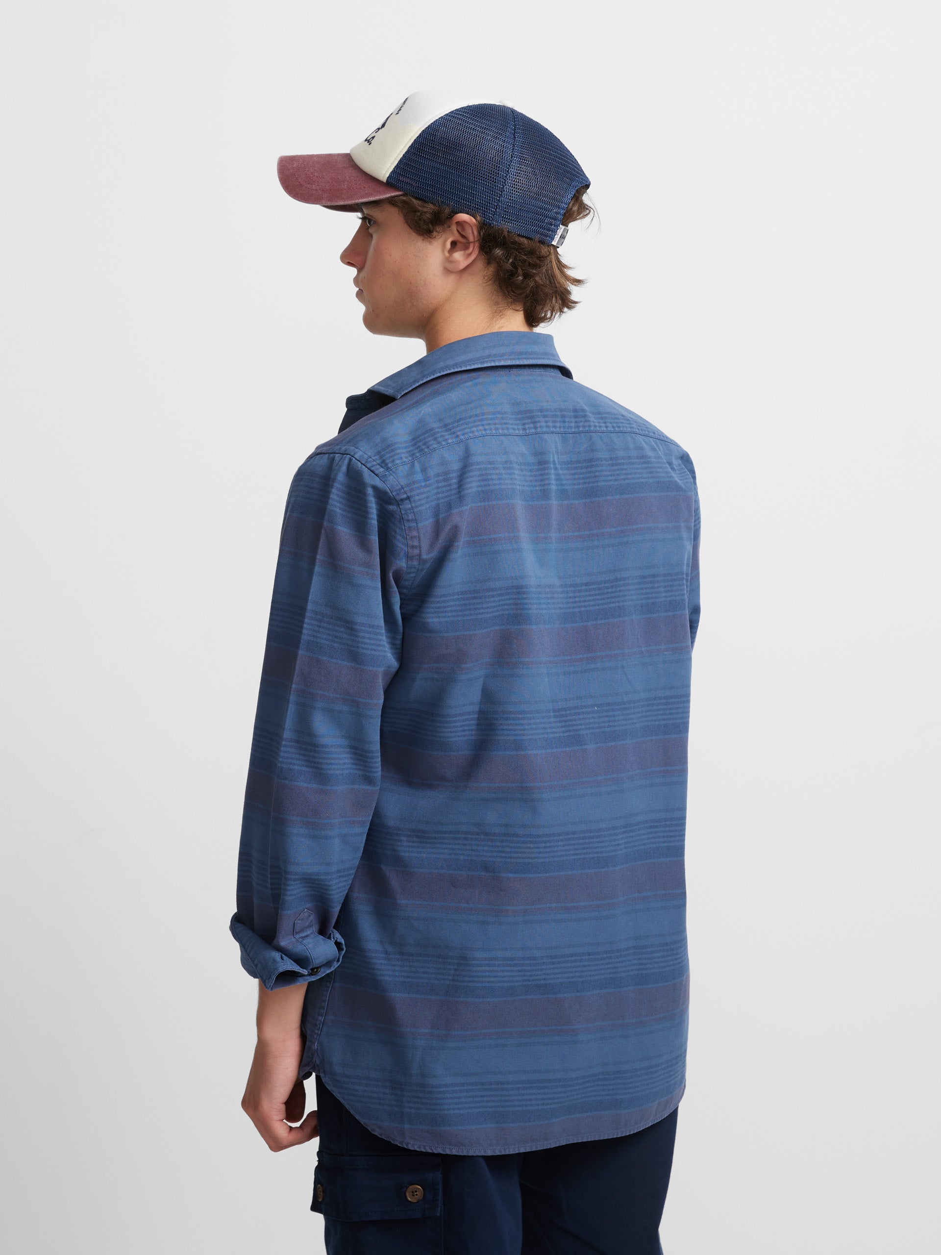 Sport shirt with horizontal stripes and blue jeans