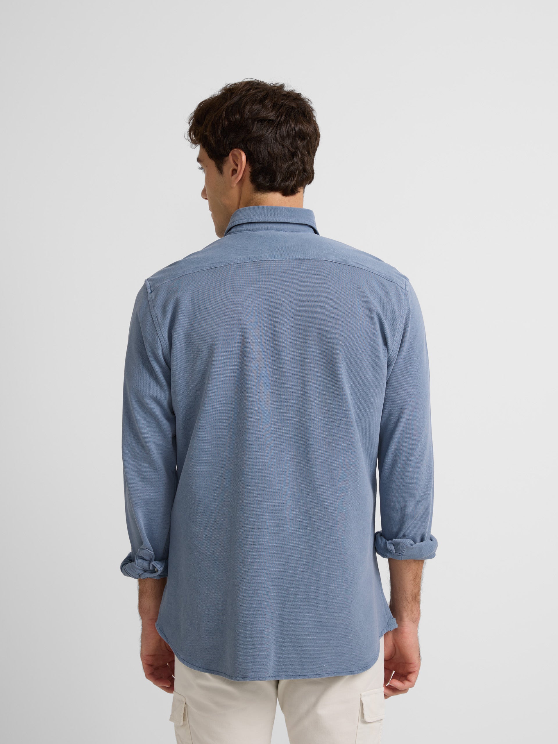 Plain blue knit sport shirt