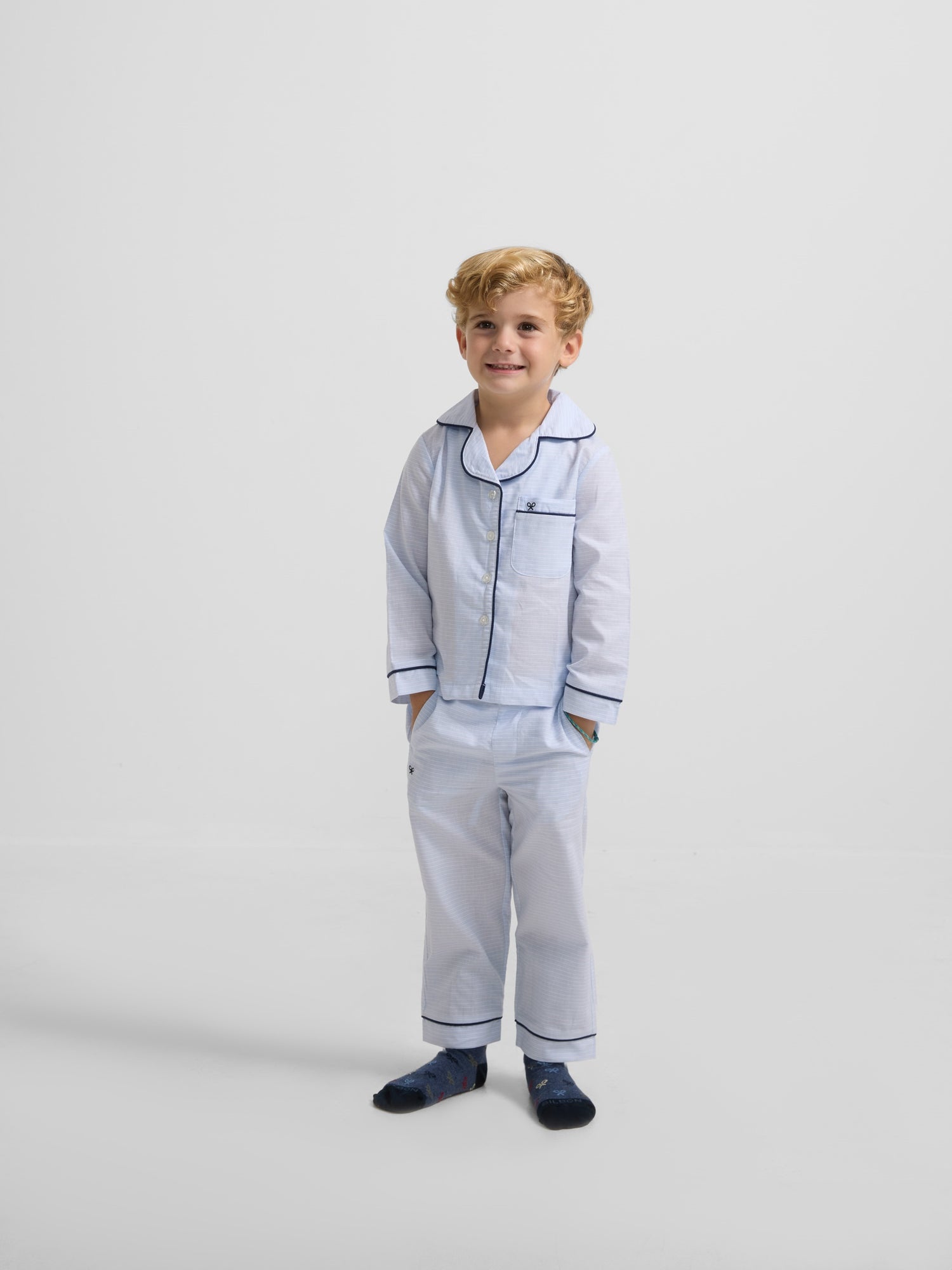 Kids' pajamas with light blue striped shirt