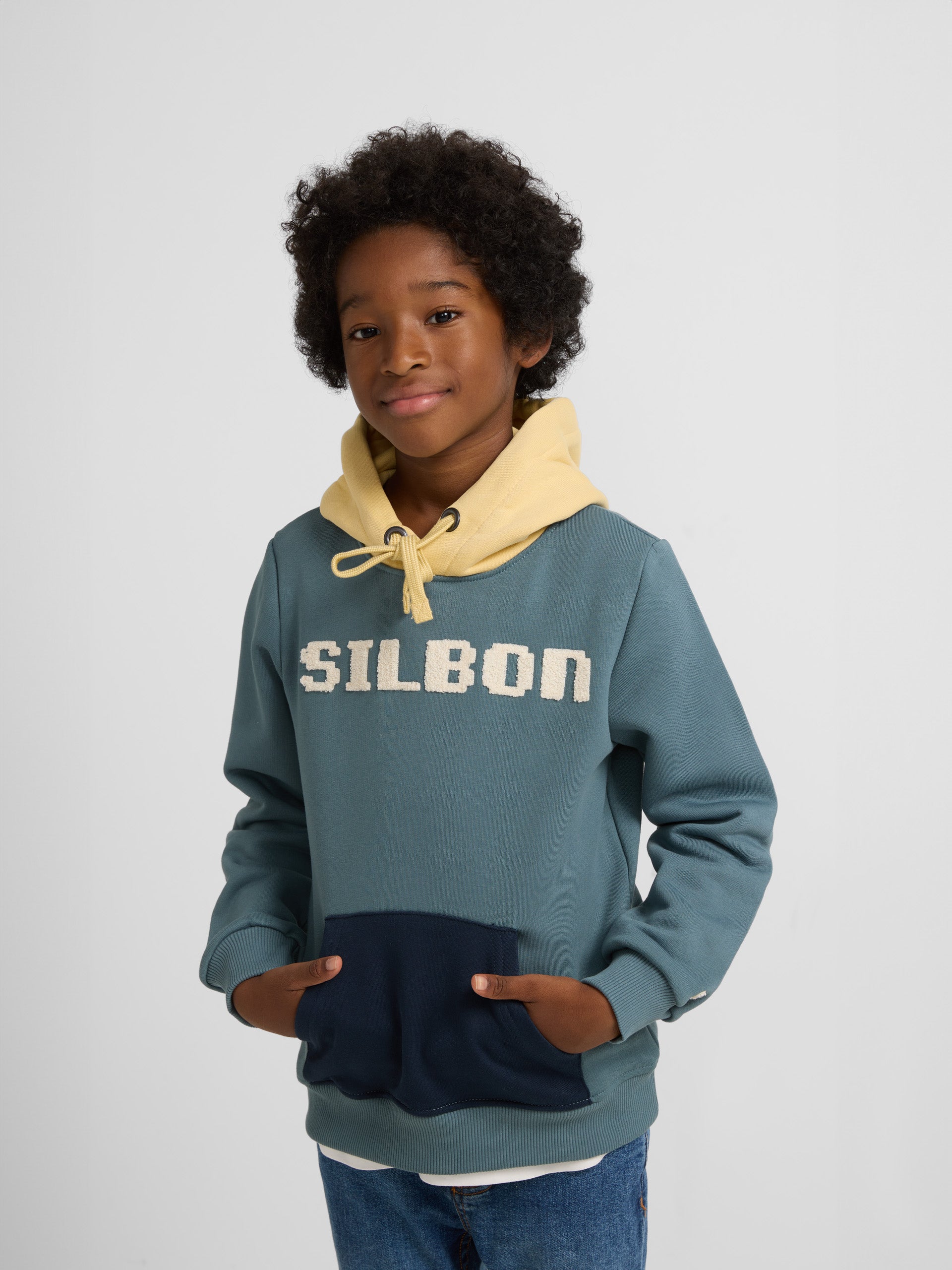 Kids hooded sweatshirt with green pocket