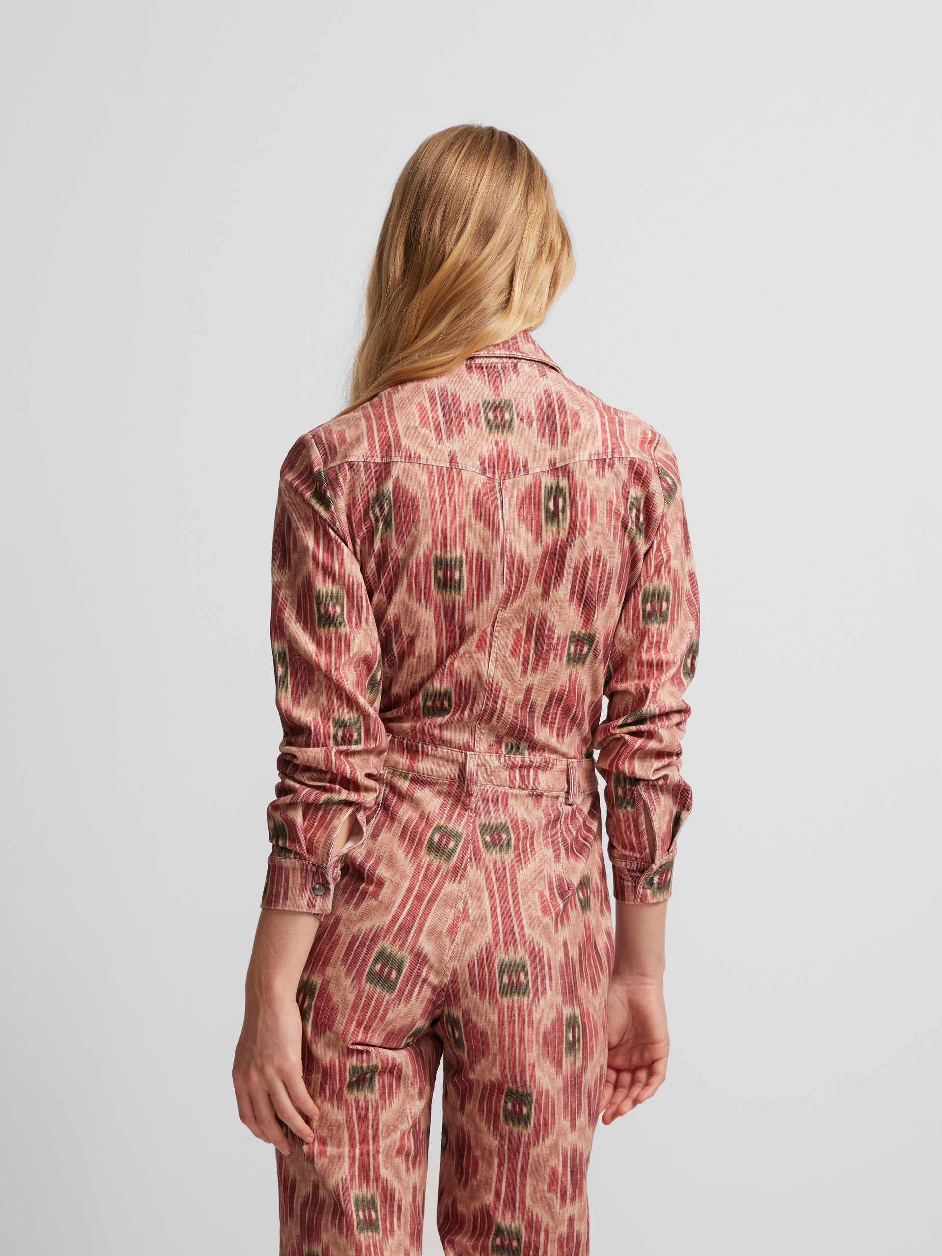 Pink printed corduroy jumpsuit