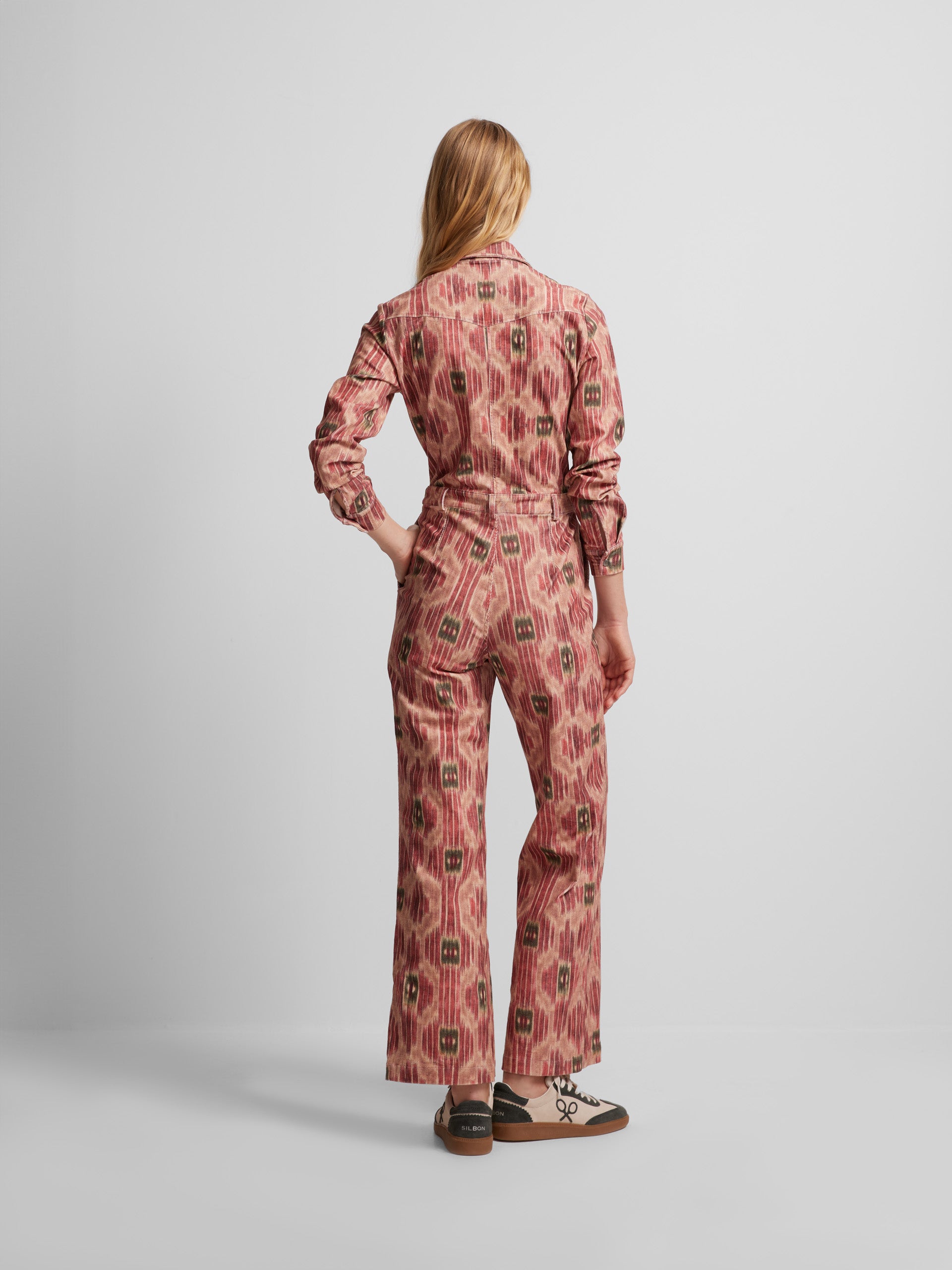 Pink printed corduroy jumpsuit