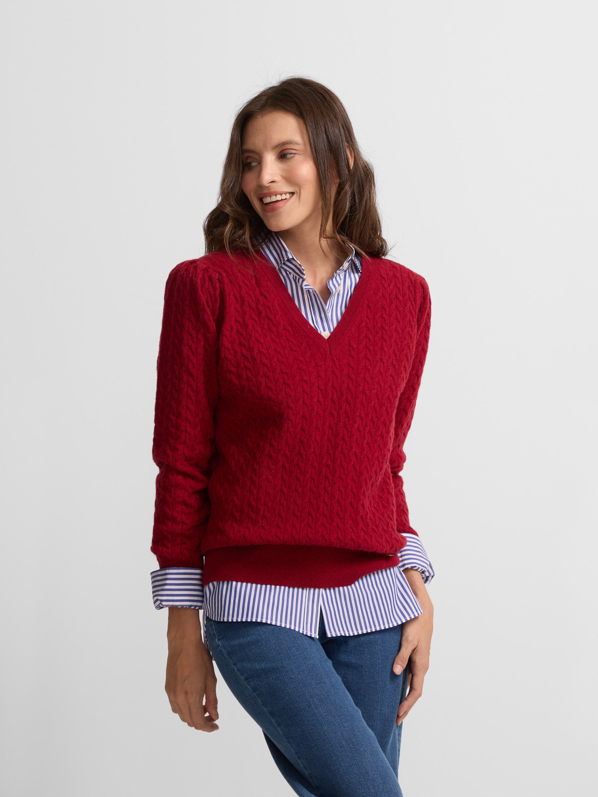 Red V-neck cable knit sweater