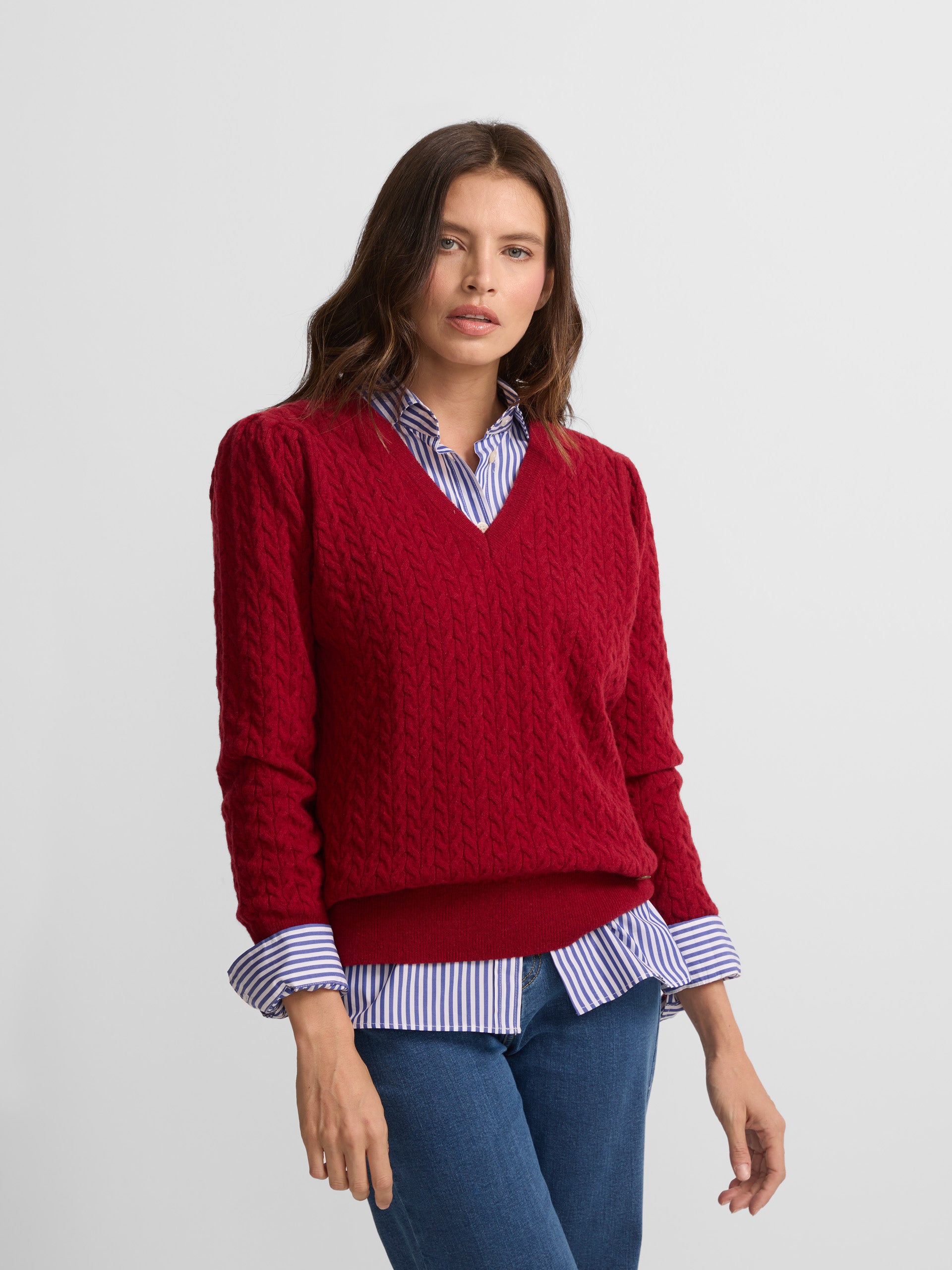 Red V-neck cable knit sweater