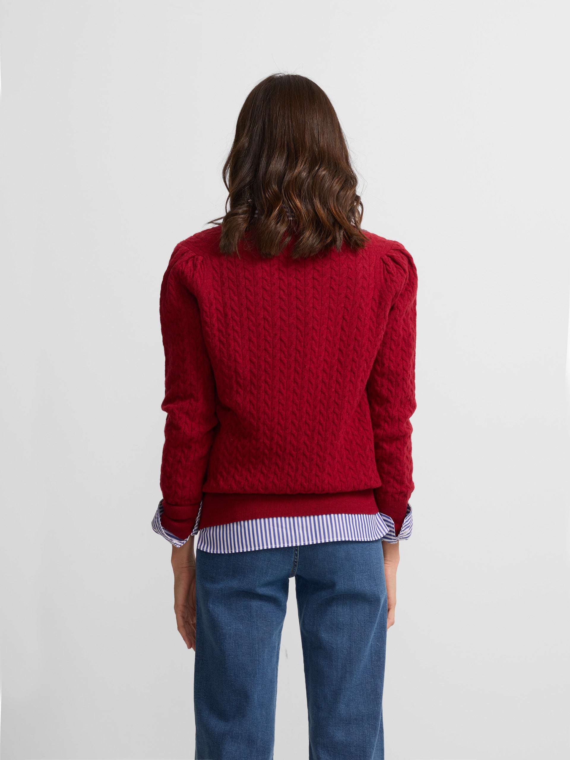 Red V-neck cable knit sweater