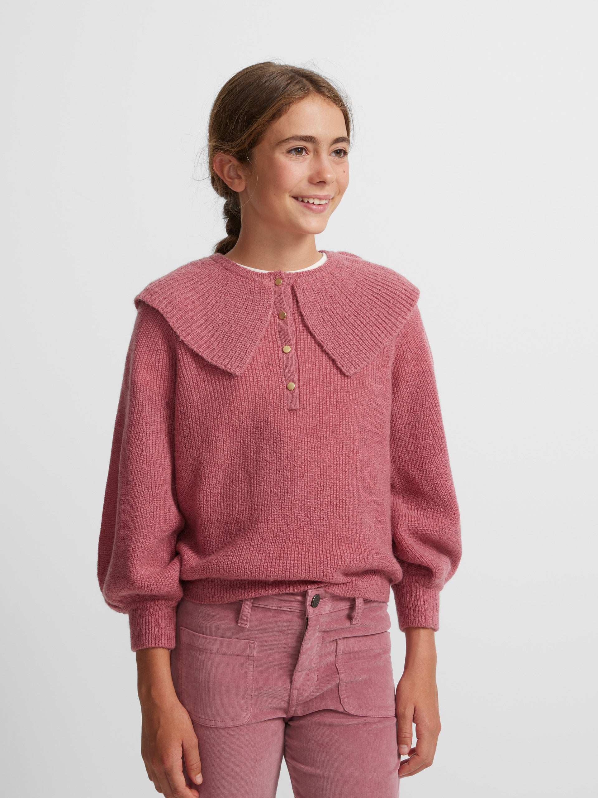 Pull fille rose en maille col volanté