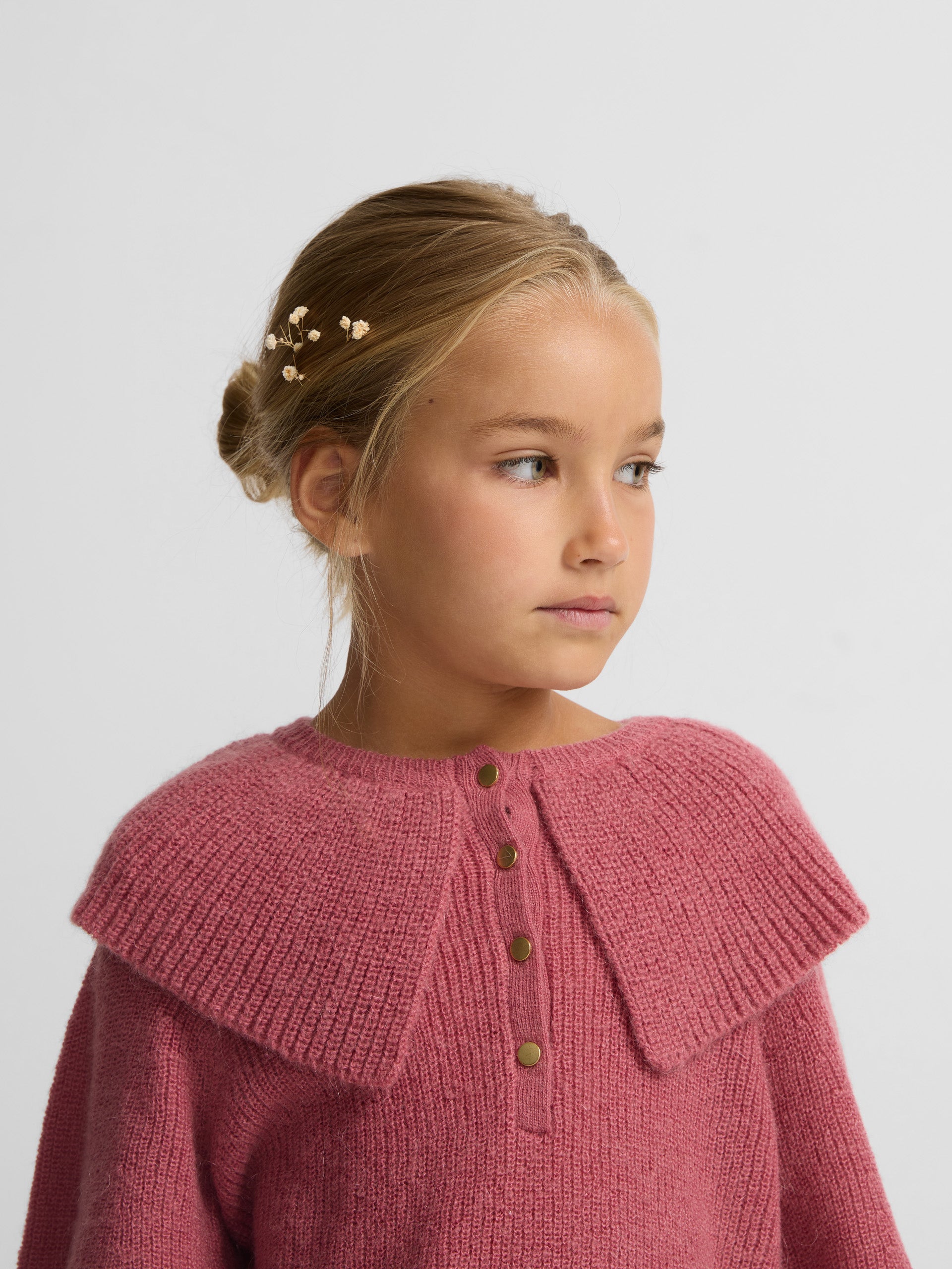 Pull fille rose en maille col volanté