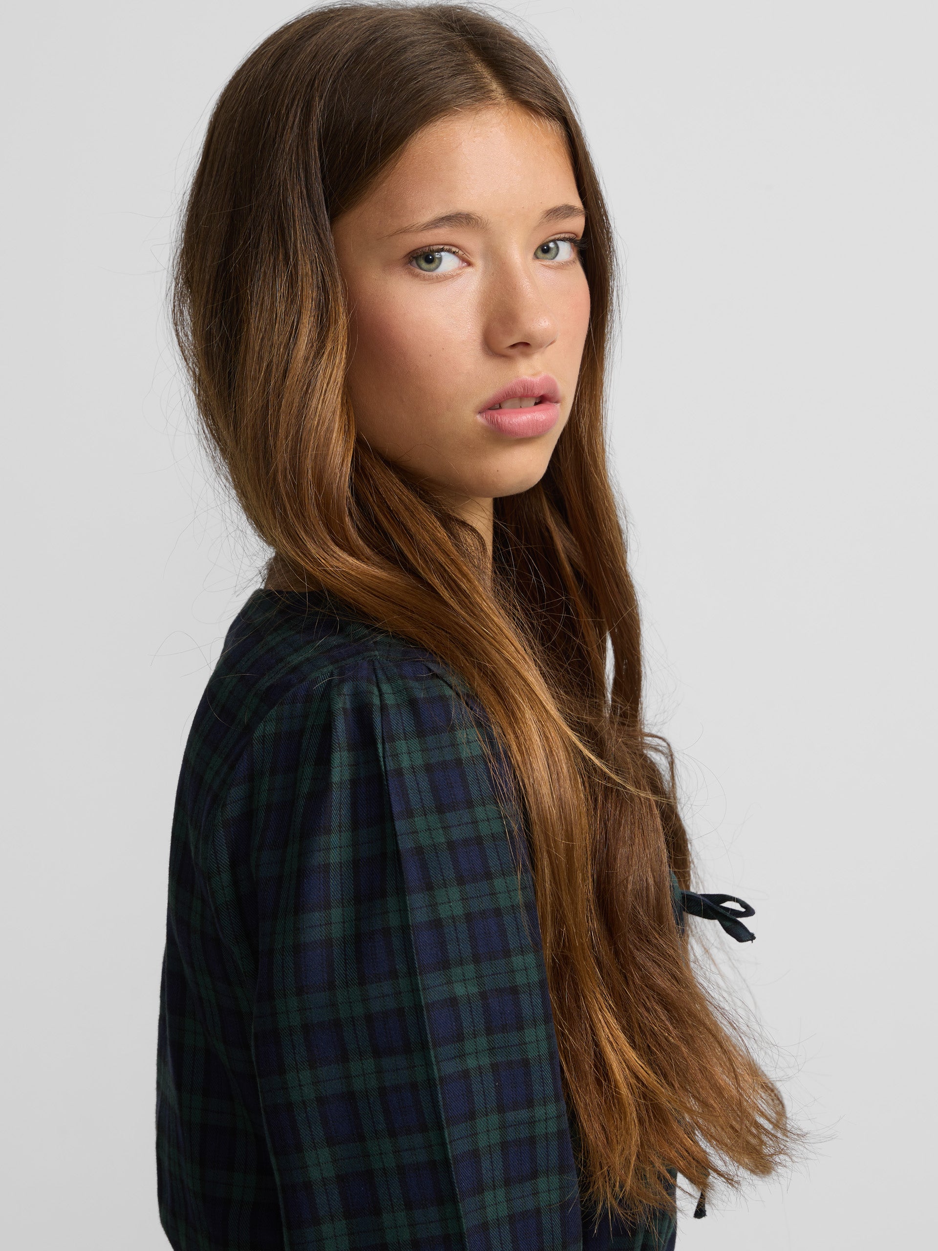 Navy and green checked blouse with bows