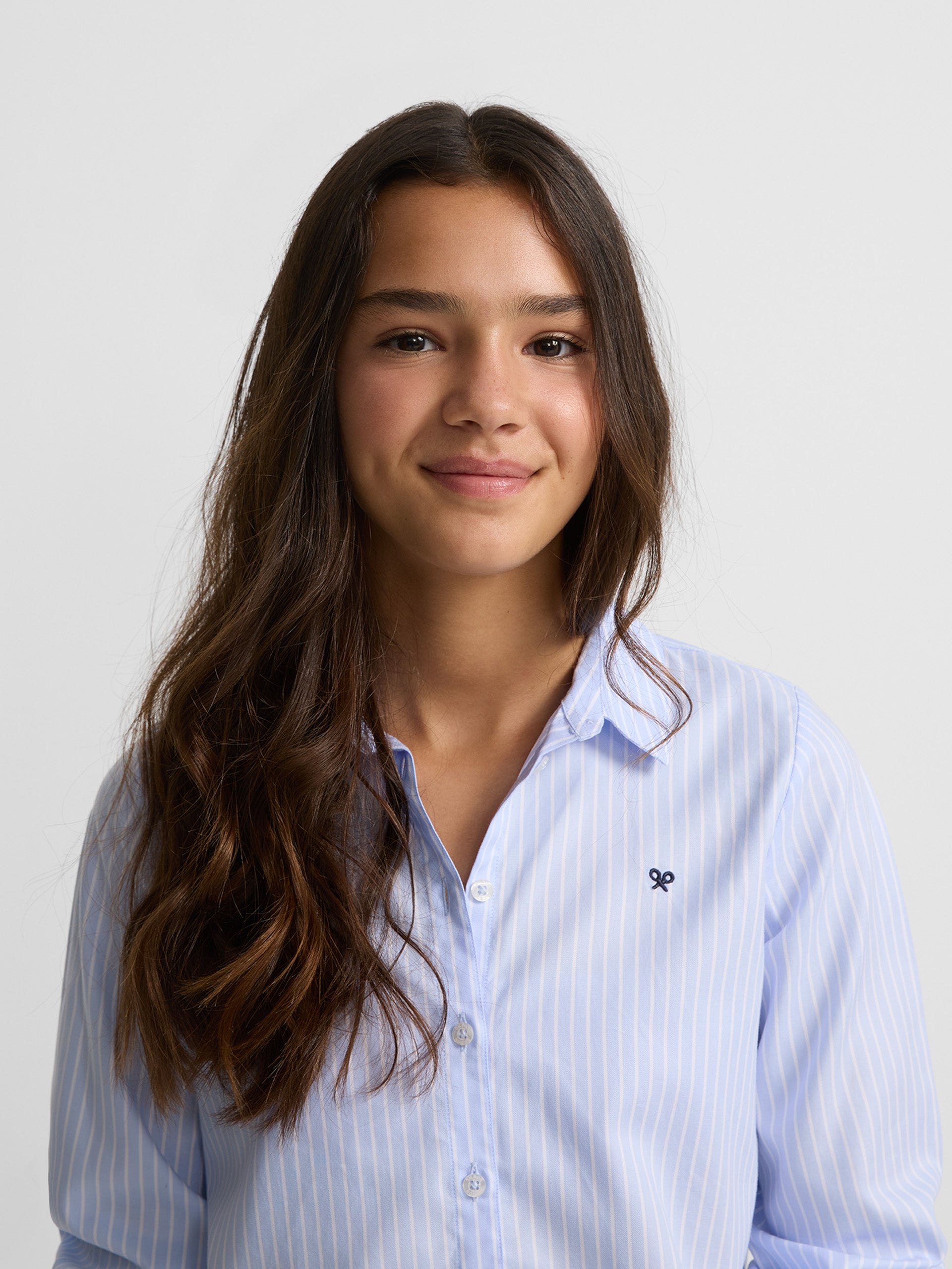 Girl's light blue striped shirt