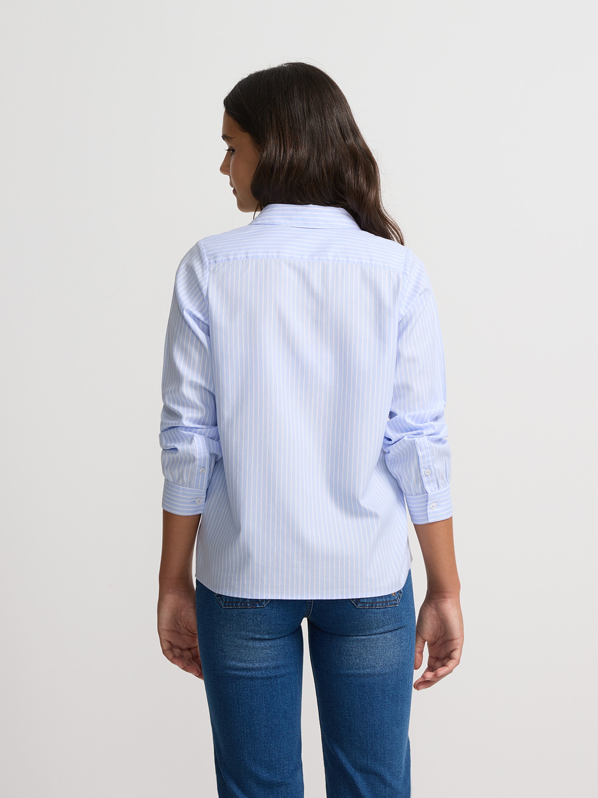 Girl's light blue striped shirt