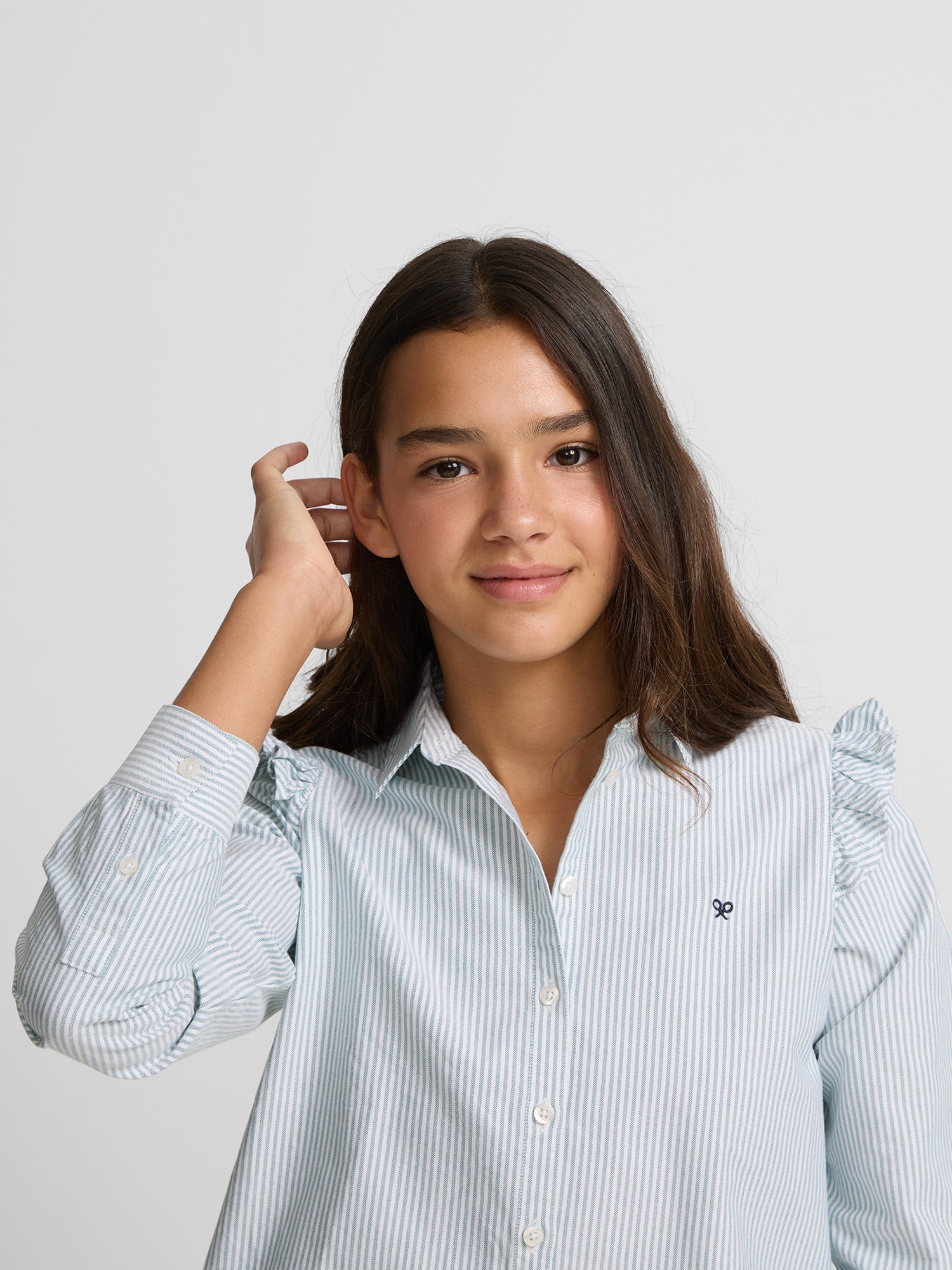 Girl's green striped shirt