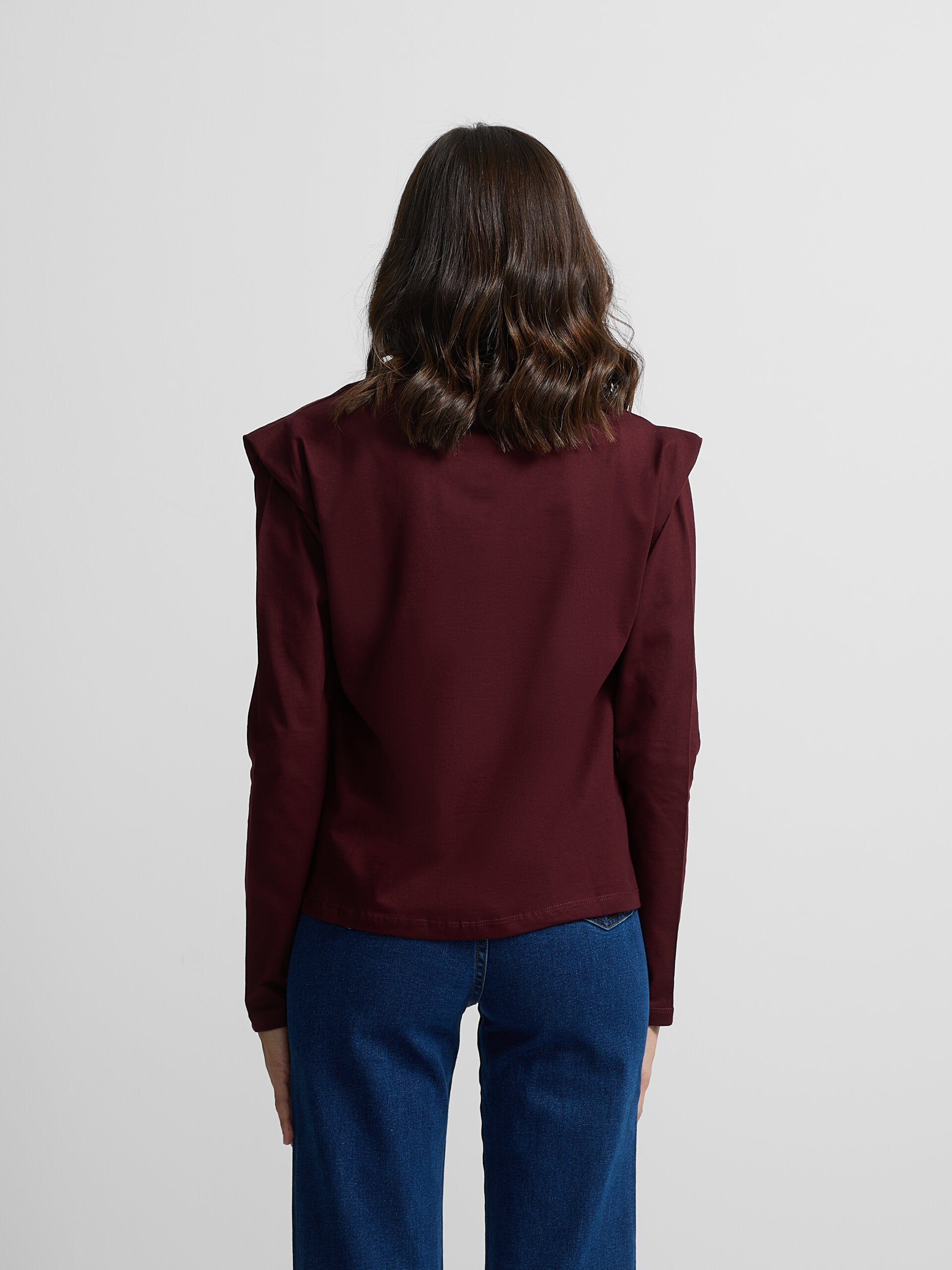 Woman's t-shirt with maroon shoulder pads