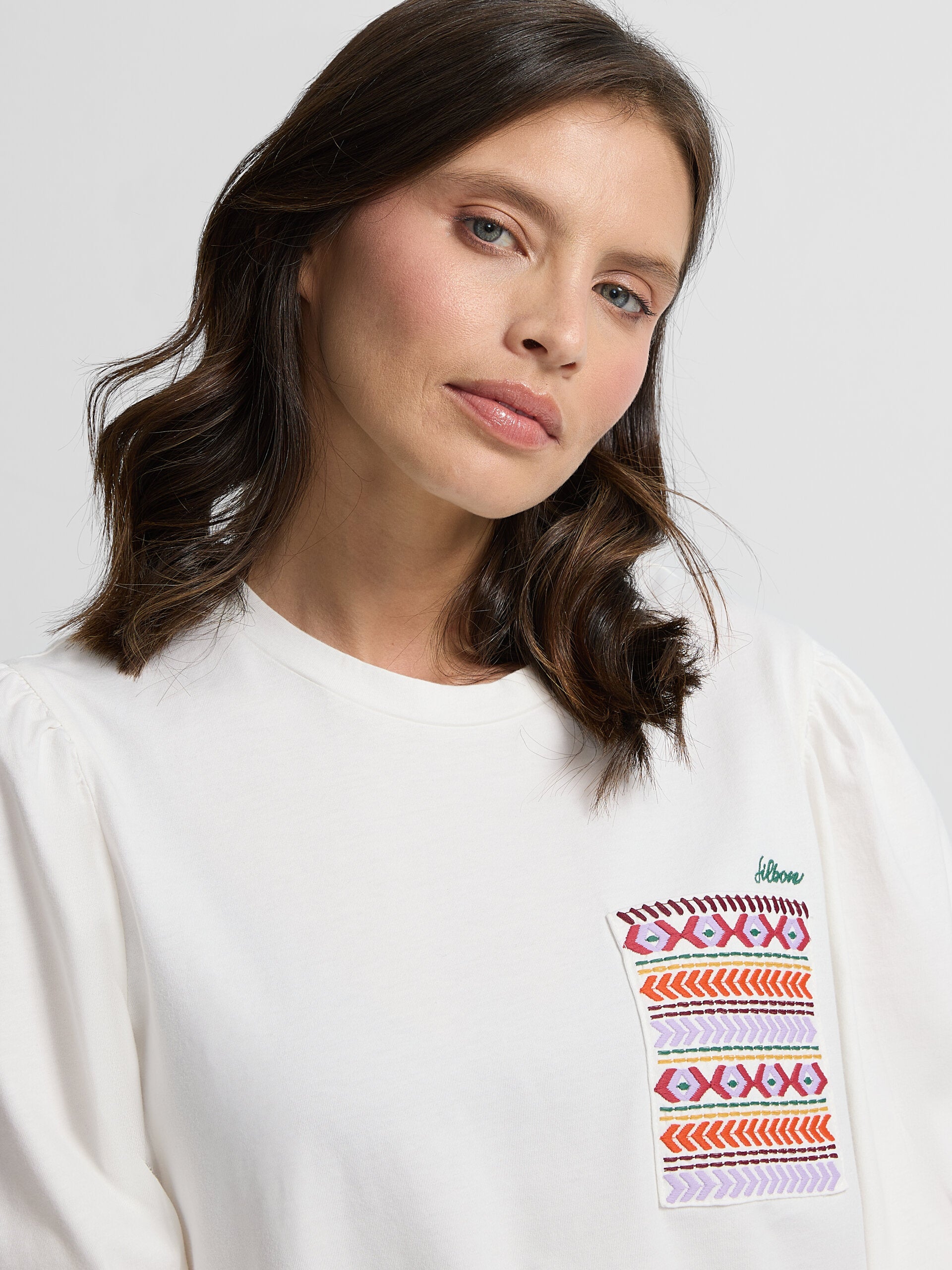 White ethnic pocket woman t-shirt