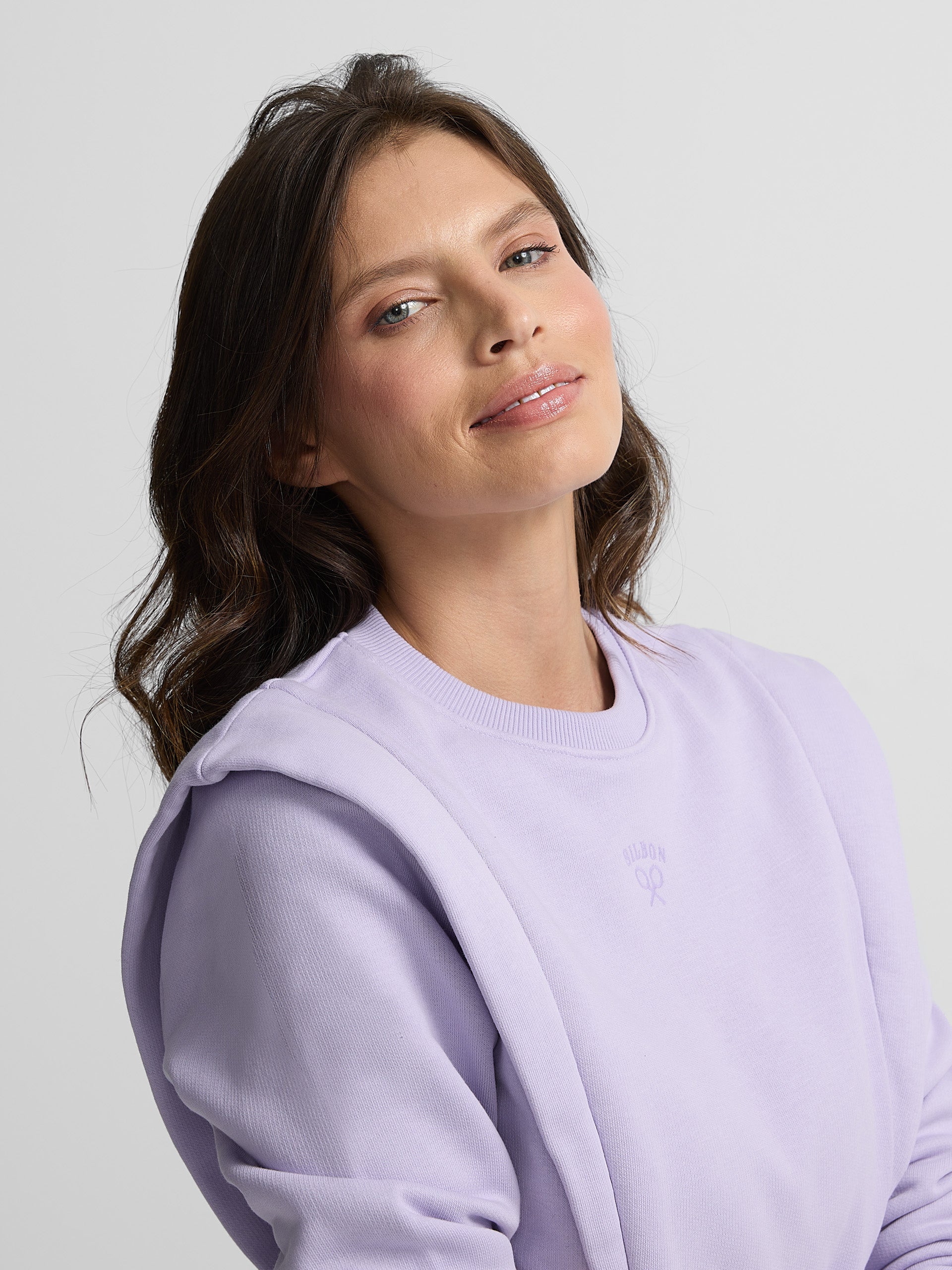 Woman sweatshirt with purple shoulder pads