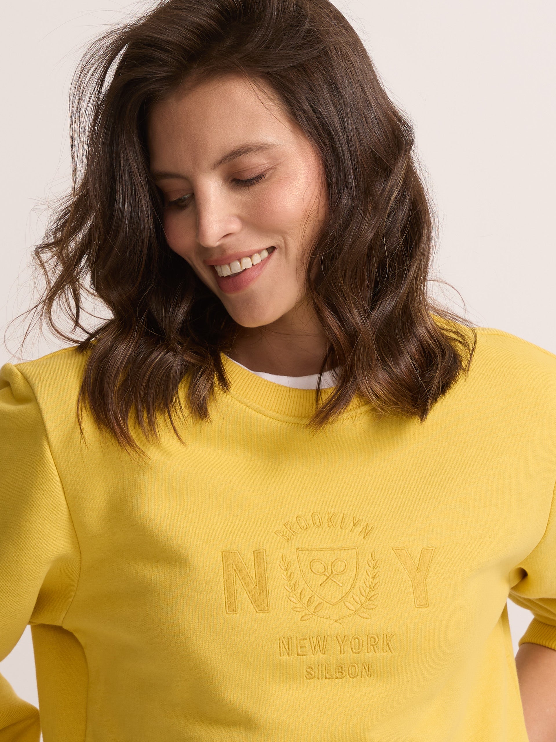 Sweat femme jaune bouclier silbon