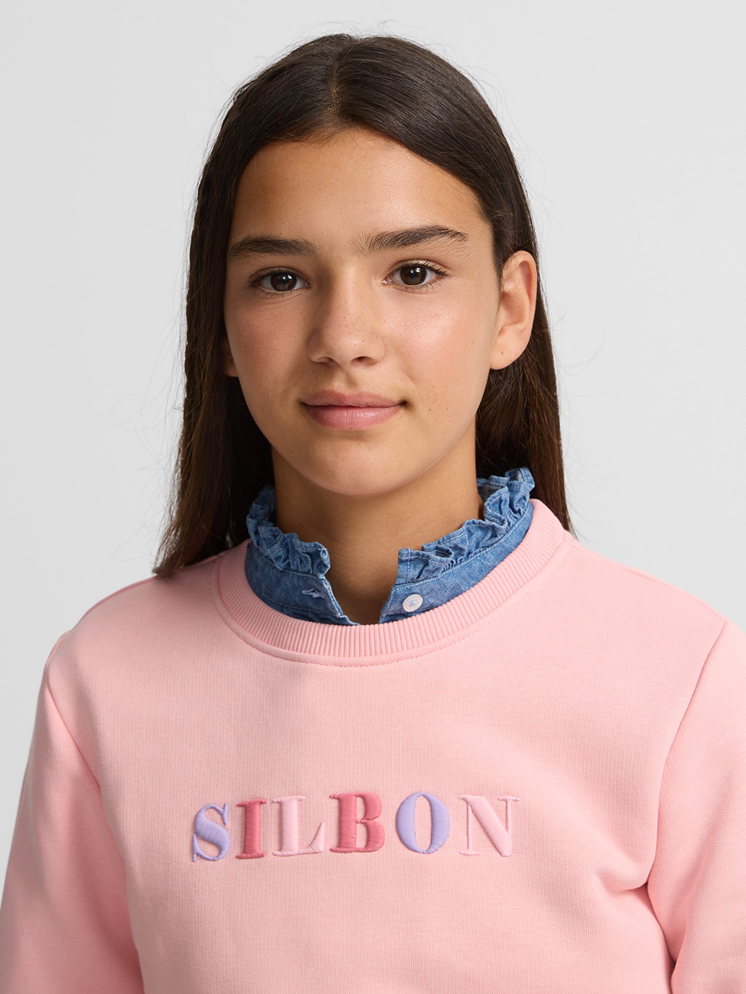 Girl's sweatshirt with pink whistle letters