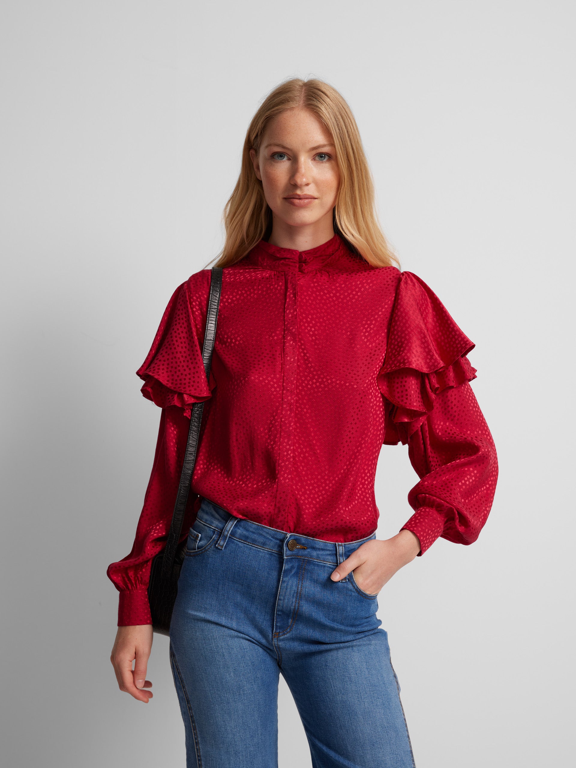 Red jacquard ruffle blouse