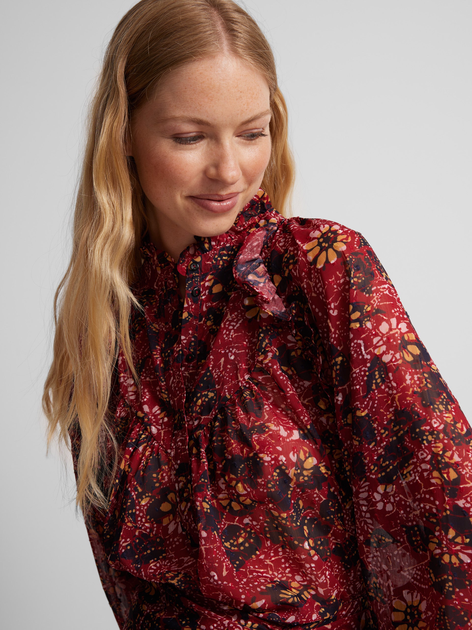 Red print knot blouse