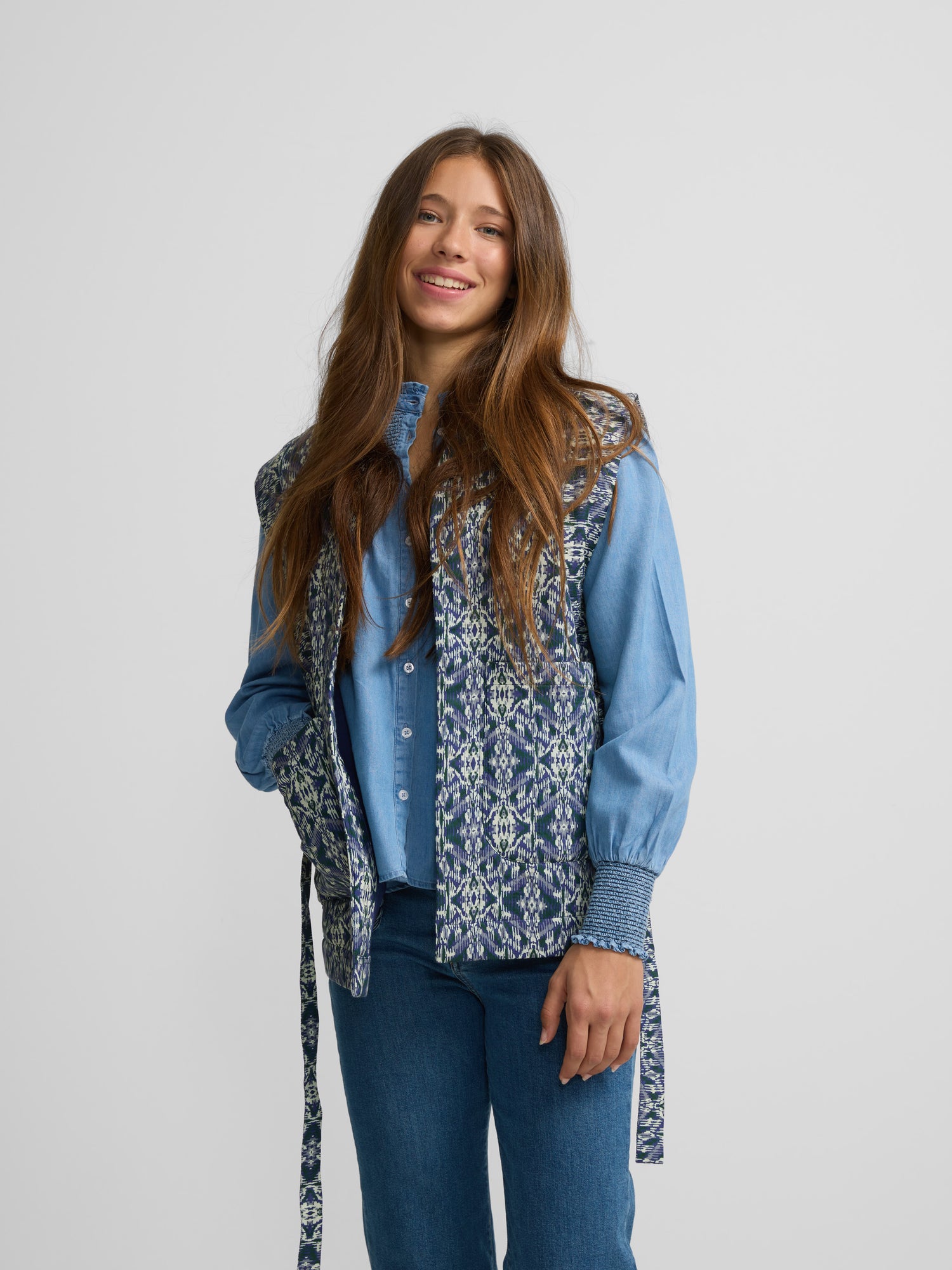 Blue printed quilted vest